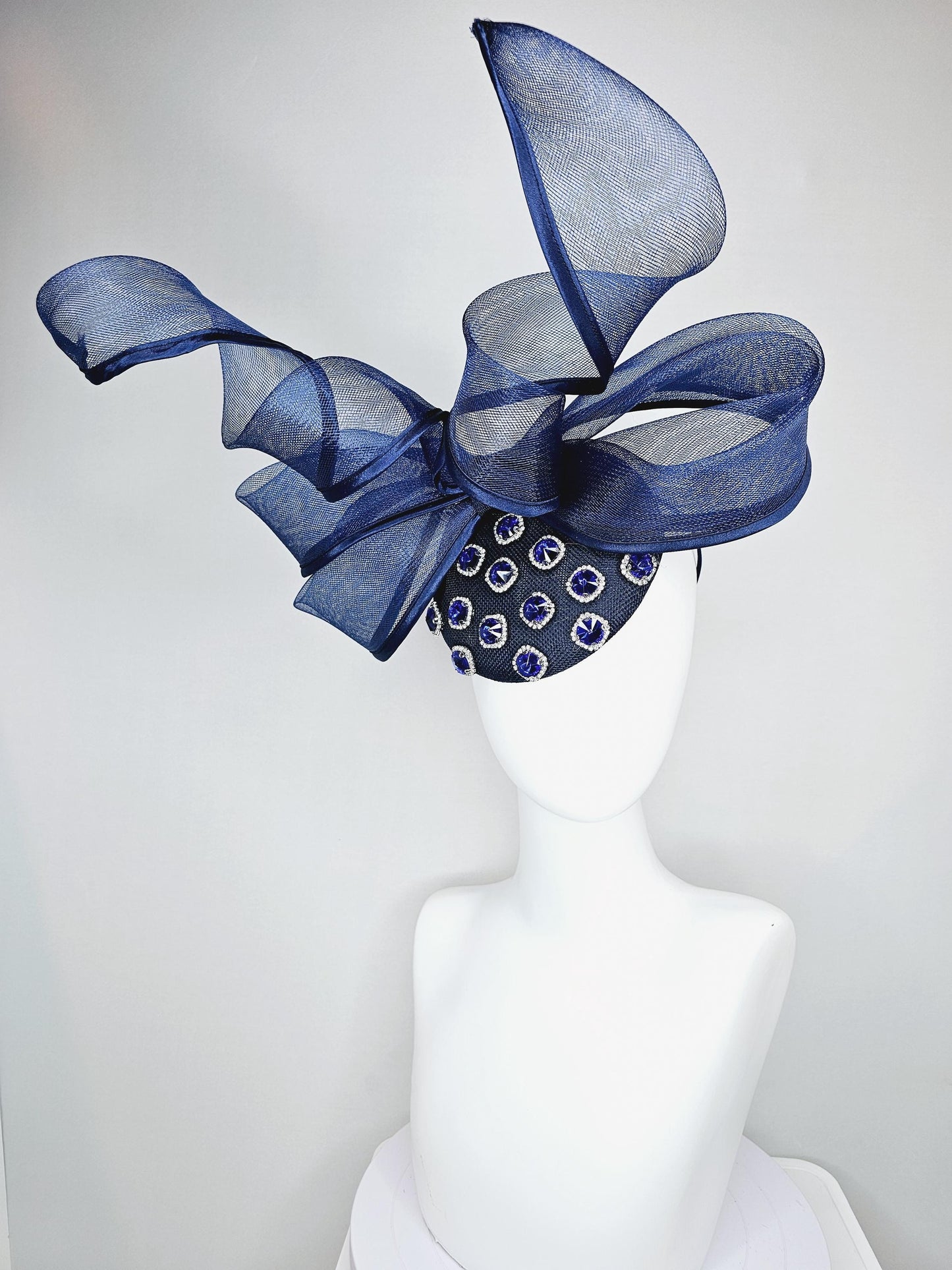 kentucky derby hat fascinator navy blue sinamay with navy blue crystal jewels, mesh and wired ribbon large bendable navy blue bow decor