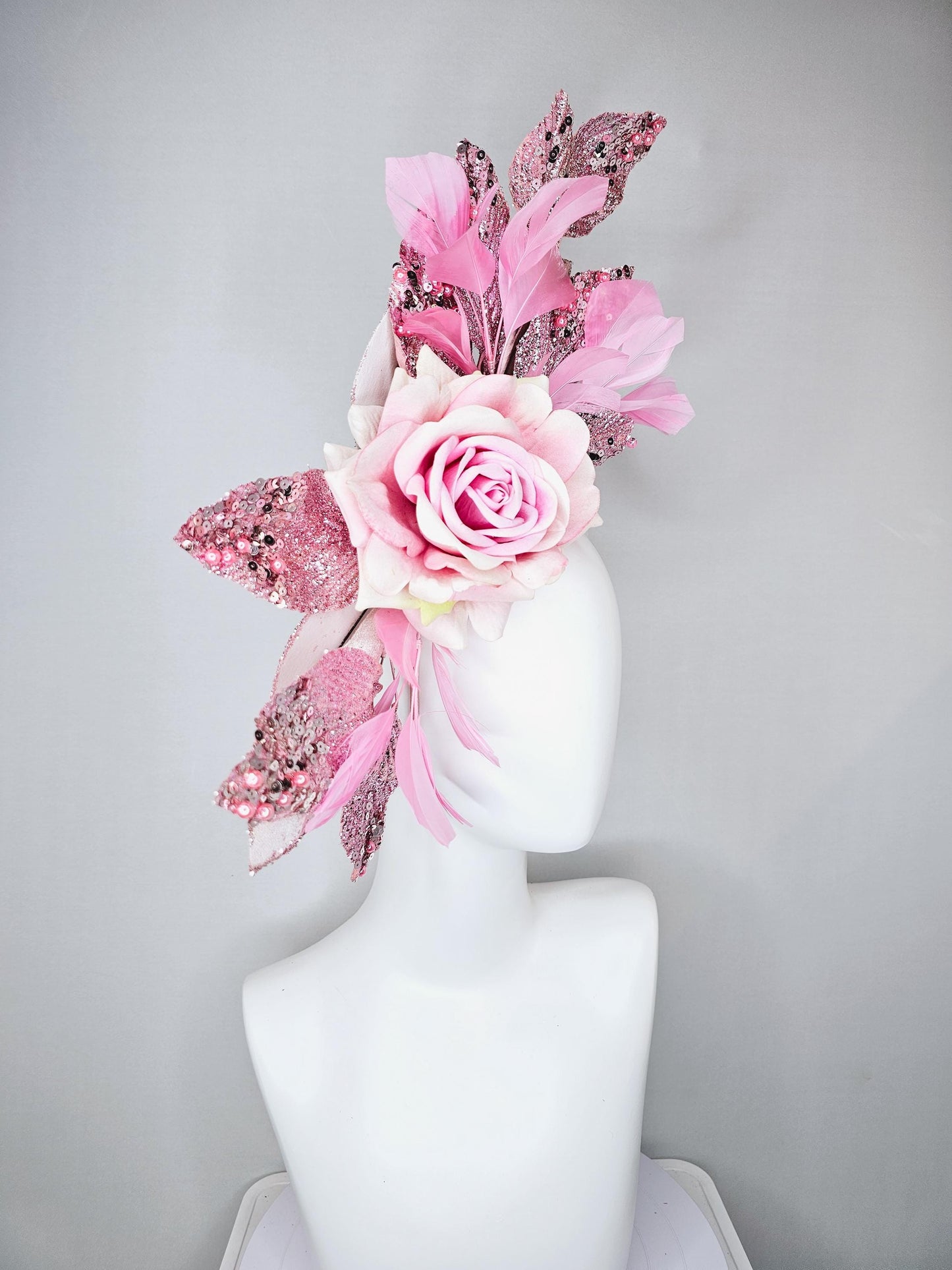 kentucky derby hat fascinator baby pink satin silk rose flower with metallic light pink sequin satin leaves and baby pink feathers