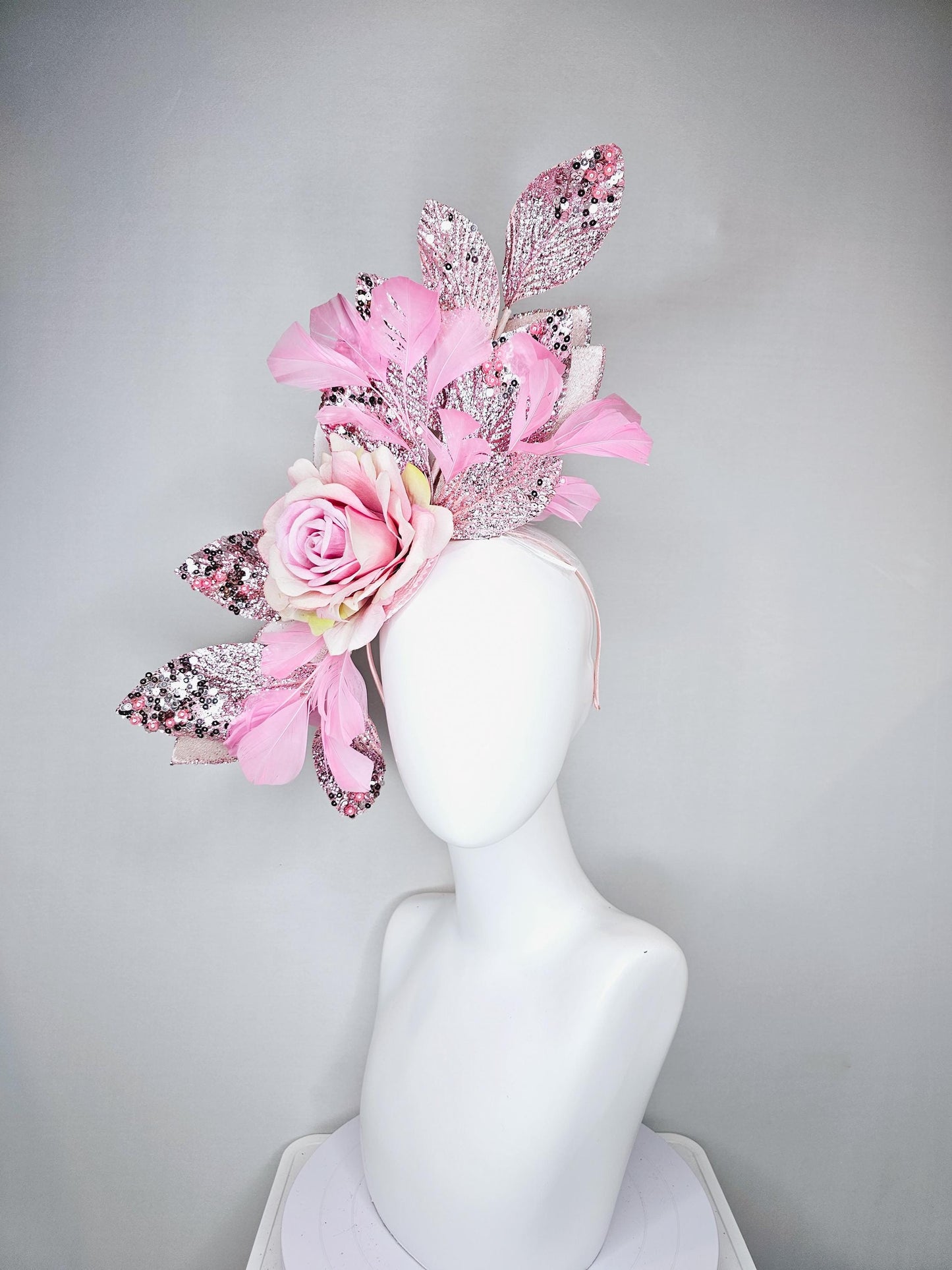 kentucky derby hat fascinator baby pink satin silk rose flower with metallic light pink sequin satin leaves and baby pink feathers