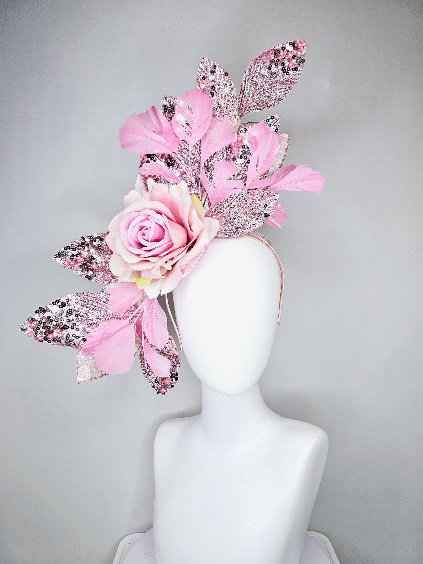 kentucky derby hat fascinator baby pink satin silk rose flower with metallic light pink sequin satin leaves and baby pink feathers