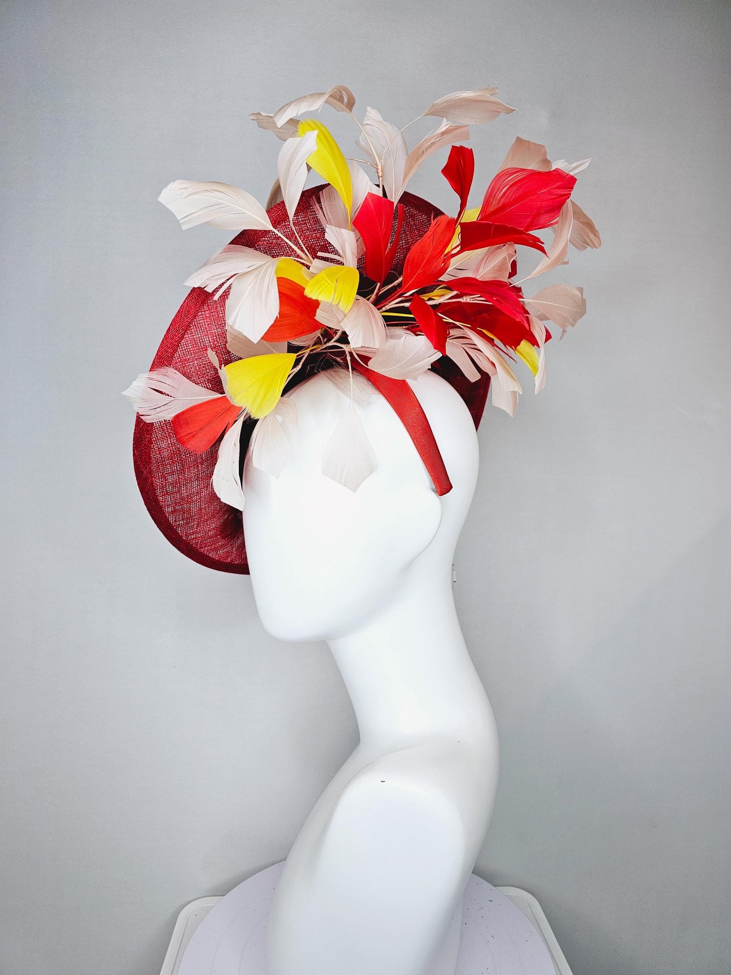 kentucky derby hat red sinamay saucer with red burgundy gold pink embroidered flowers with white ivory yeloow red feathers