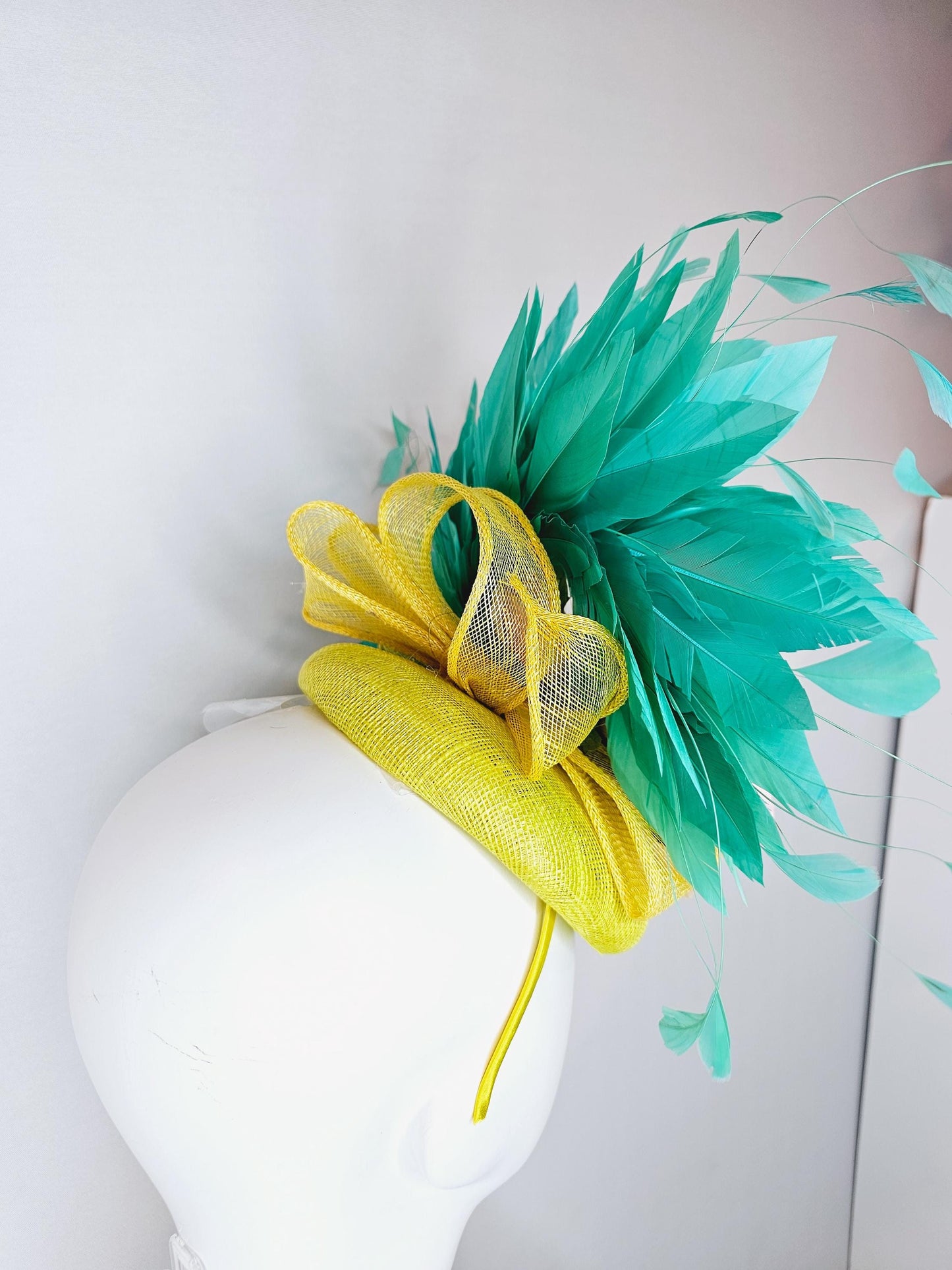 kentucky derby hat fascinator yellow sinamay with yellow sinamay curls,light pink satin silk rose flowers with leaves and aqua blue feathers