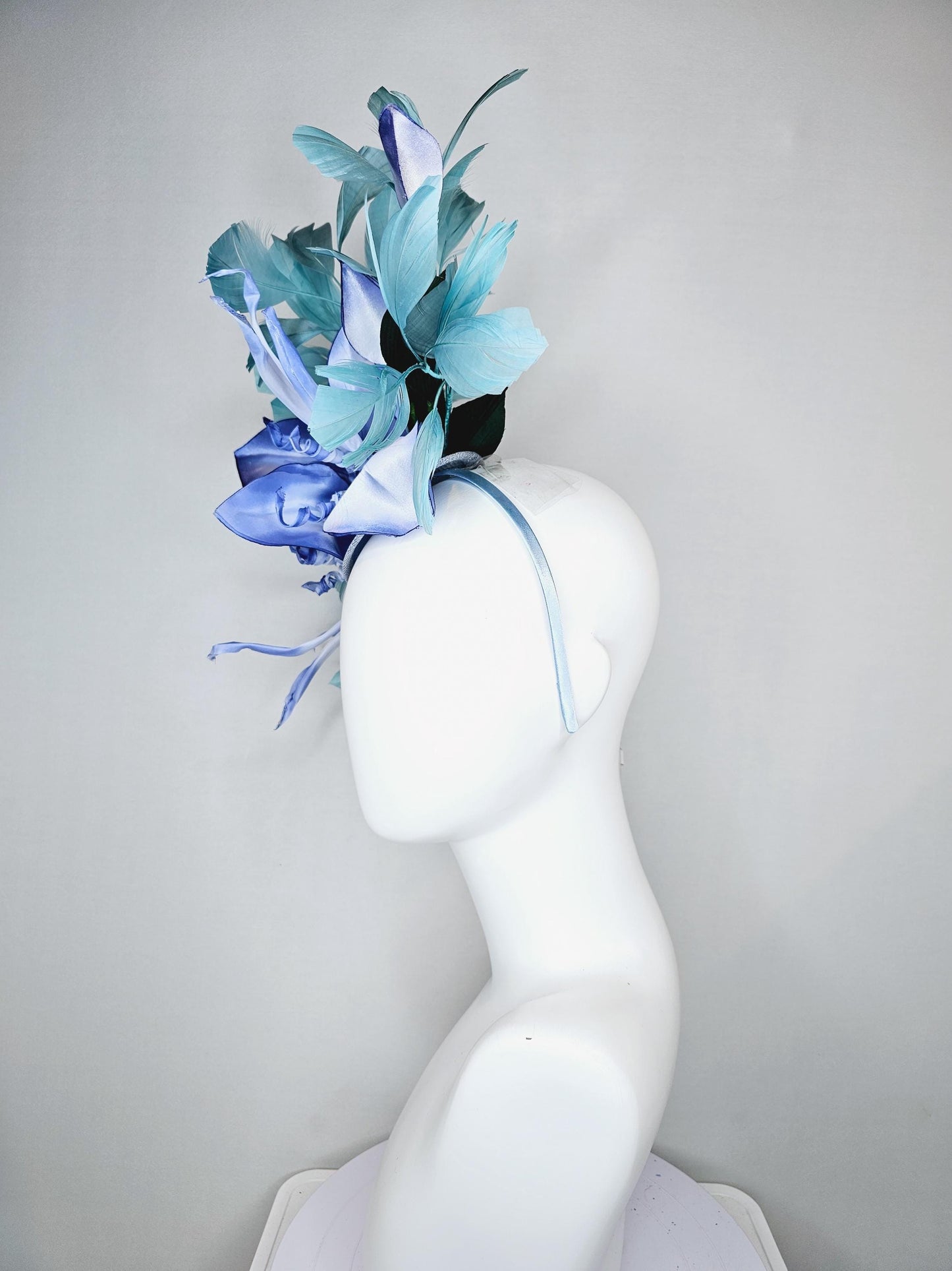 kentucky derby hat fascinator light blue sinamay with ombre blue satin silk flower and teal blue feathers