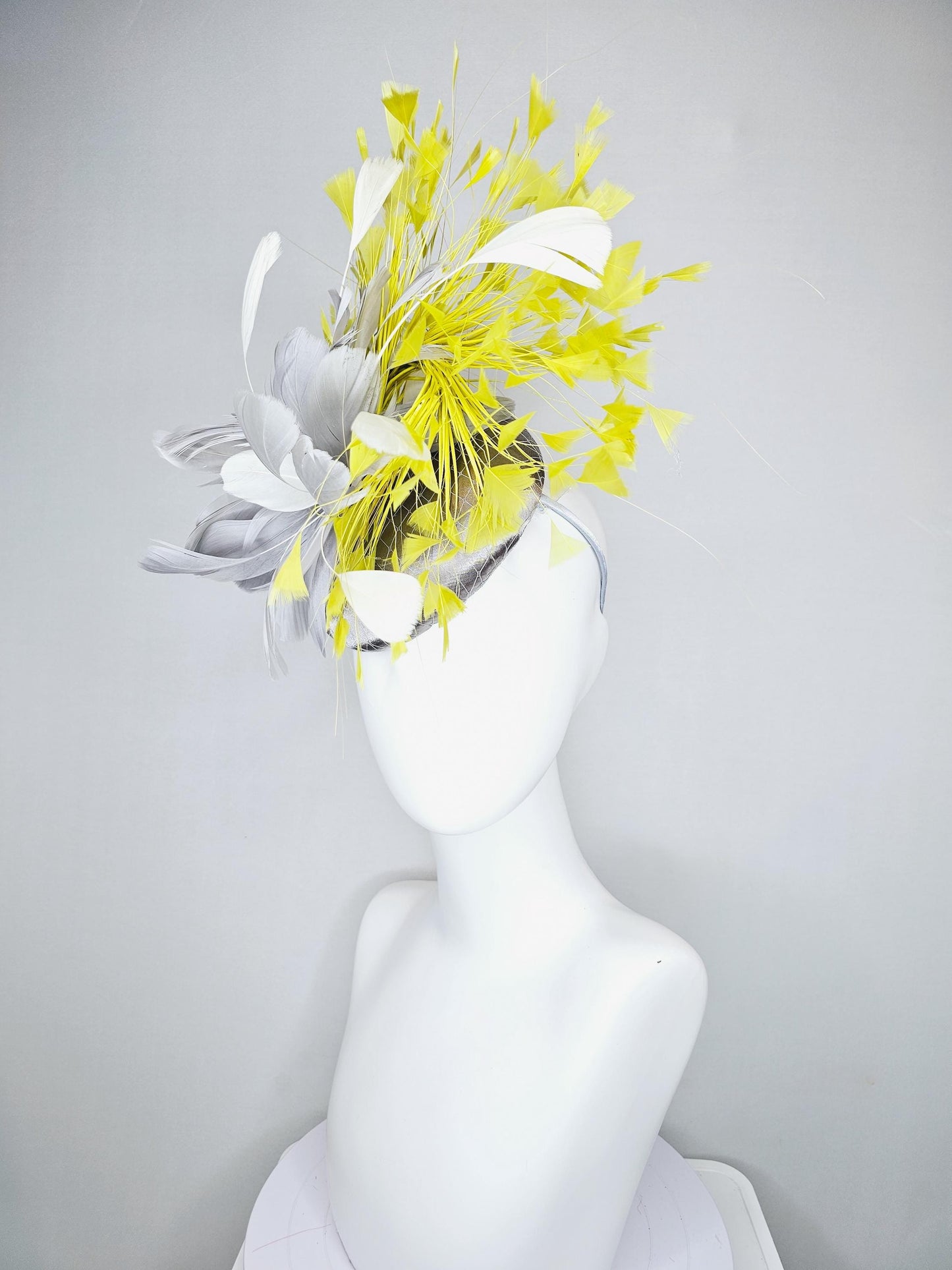 kentucky derby hat fascinator silver gray satin with netting and silver gray, mustard yellow branching feathers