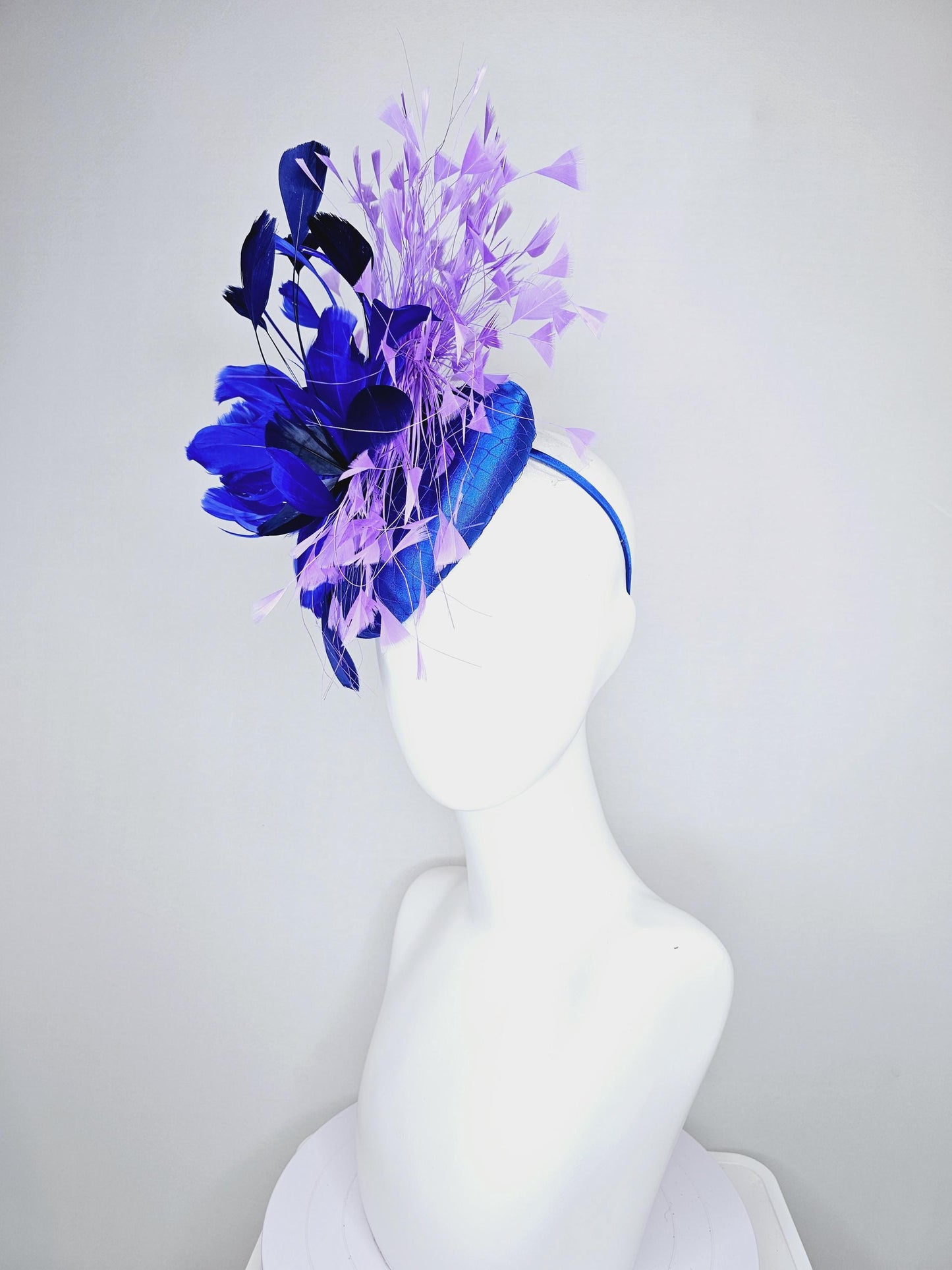 kentucky derby hat fascinator royal blue satin with netting, fluffy royal blue, navy blue, lavender purple branching feathers