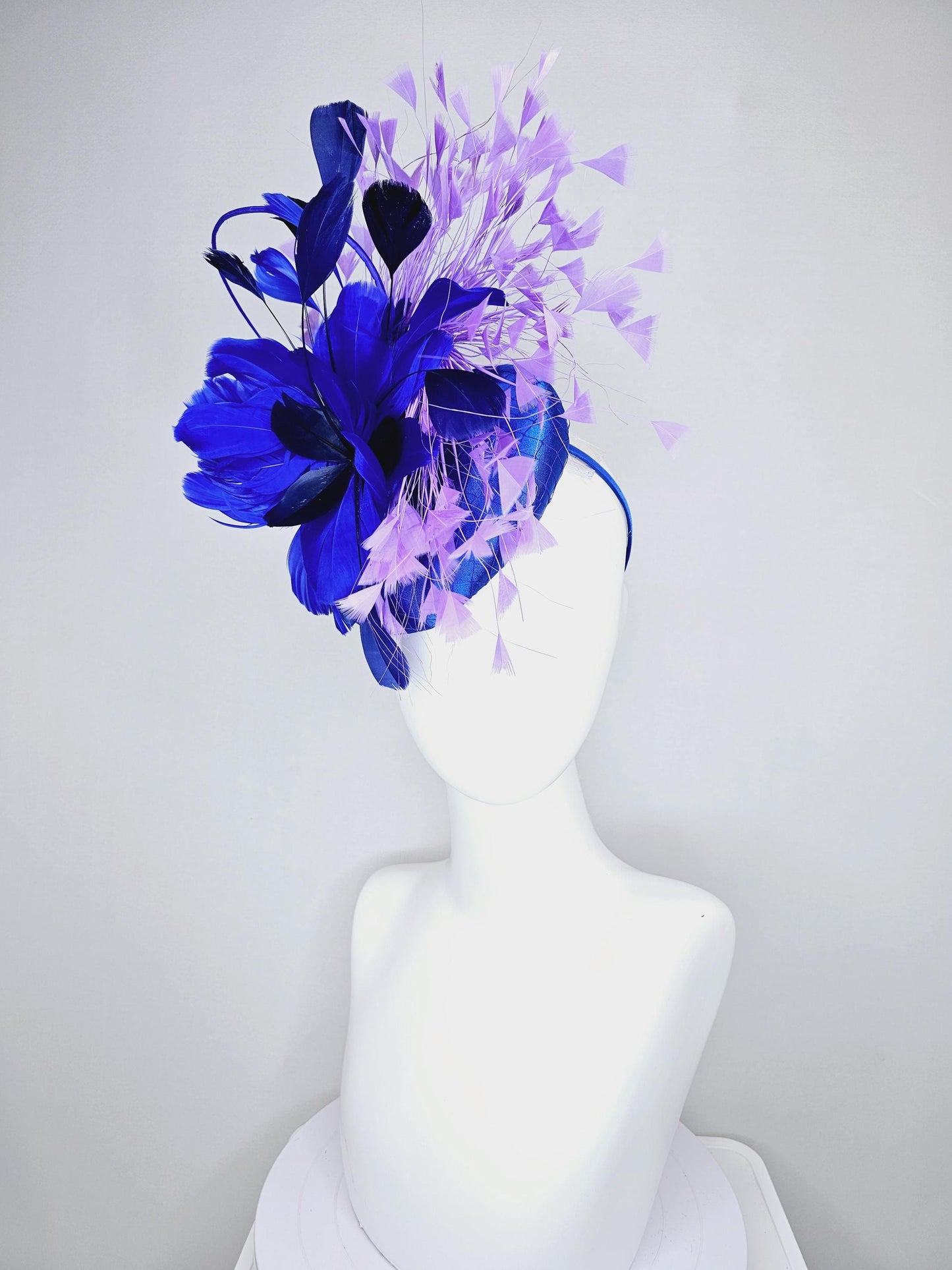 kentucky derby hat fascinator royal blue satin with netting, fluffy royal blue, navy blue, lavender purple branching feathers