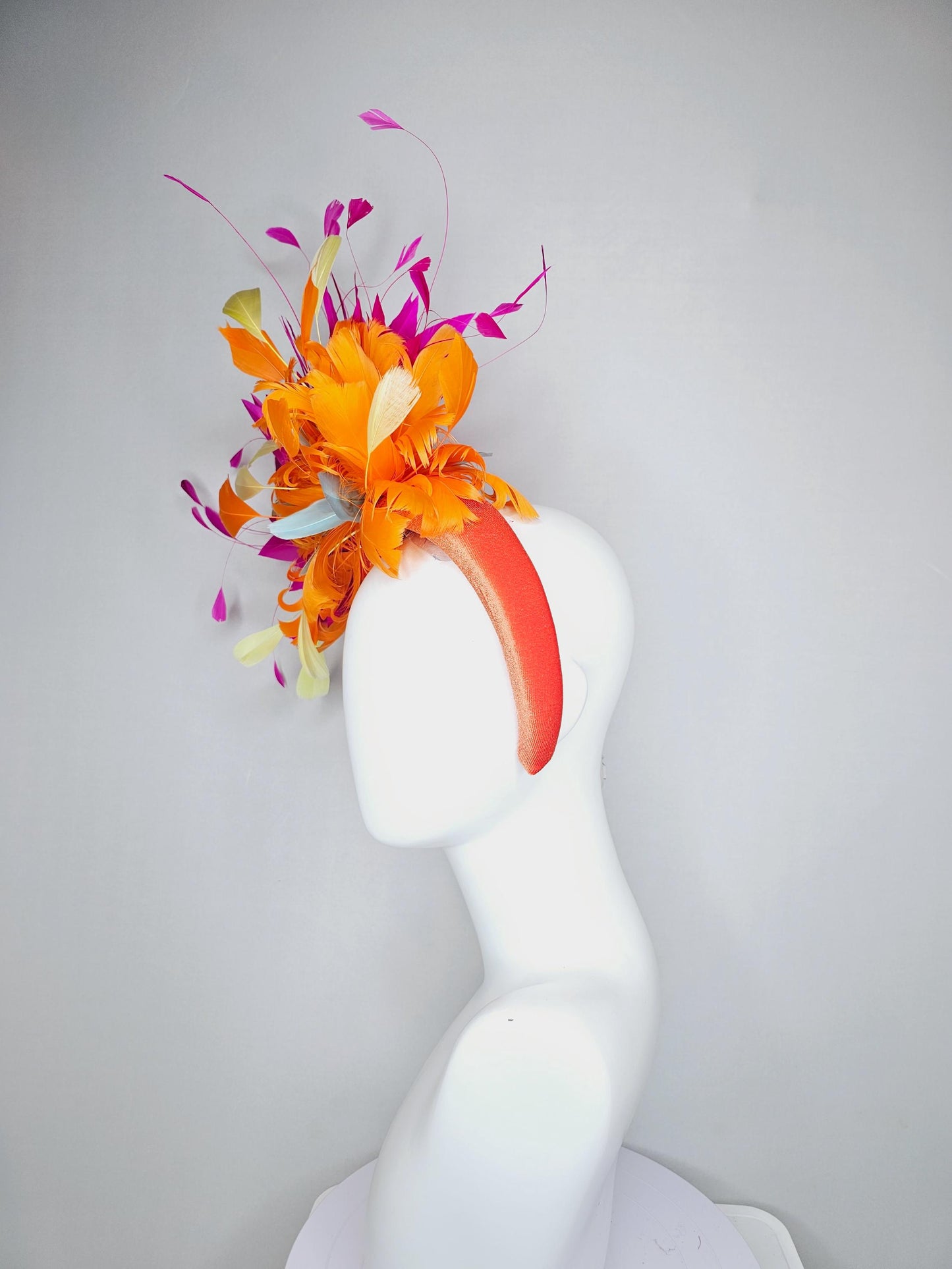 kentucky derby hat fascinator orange velvet headband, fluffy tangerine orange, light yellow, silver gray, fuchsia pink branching feathers