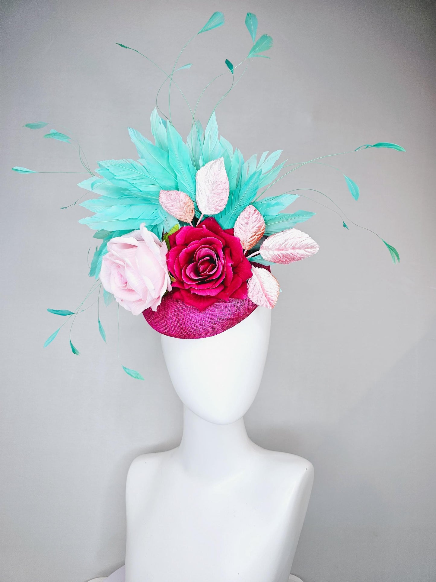 kentucky derby hat fascinator pink sinamay with light pink fuchsia satin silk rose flowers and baby pink leaves,aqua blue branching feathers