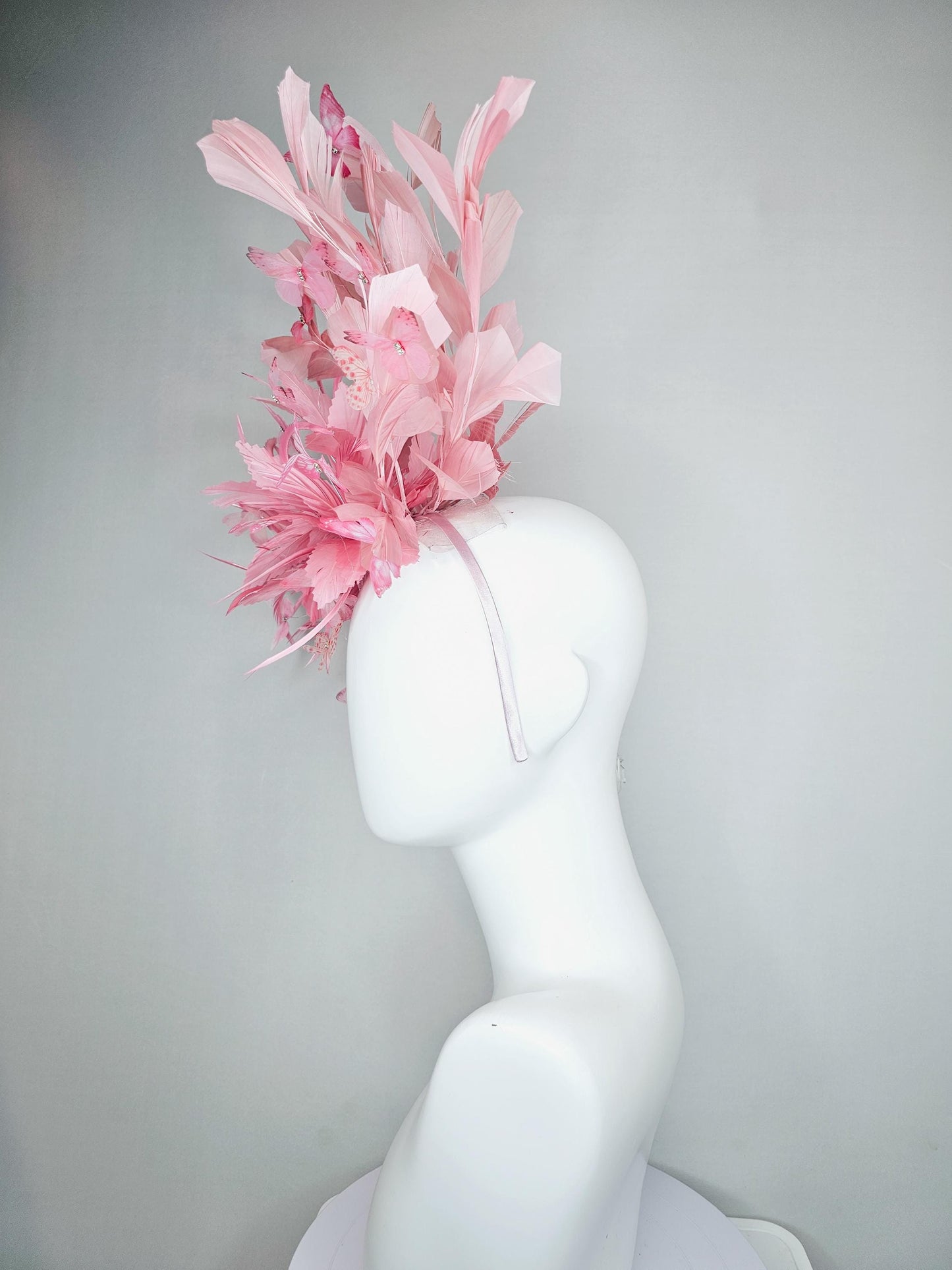 kentucky derby hat fascinator with fluffy light blush pink zigzag feather, light blush pink branching feathers, light blush pink butterflies