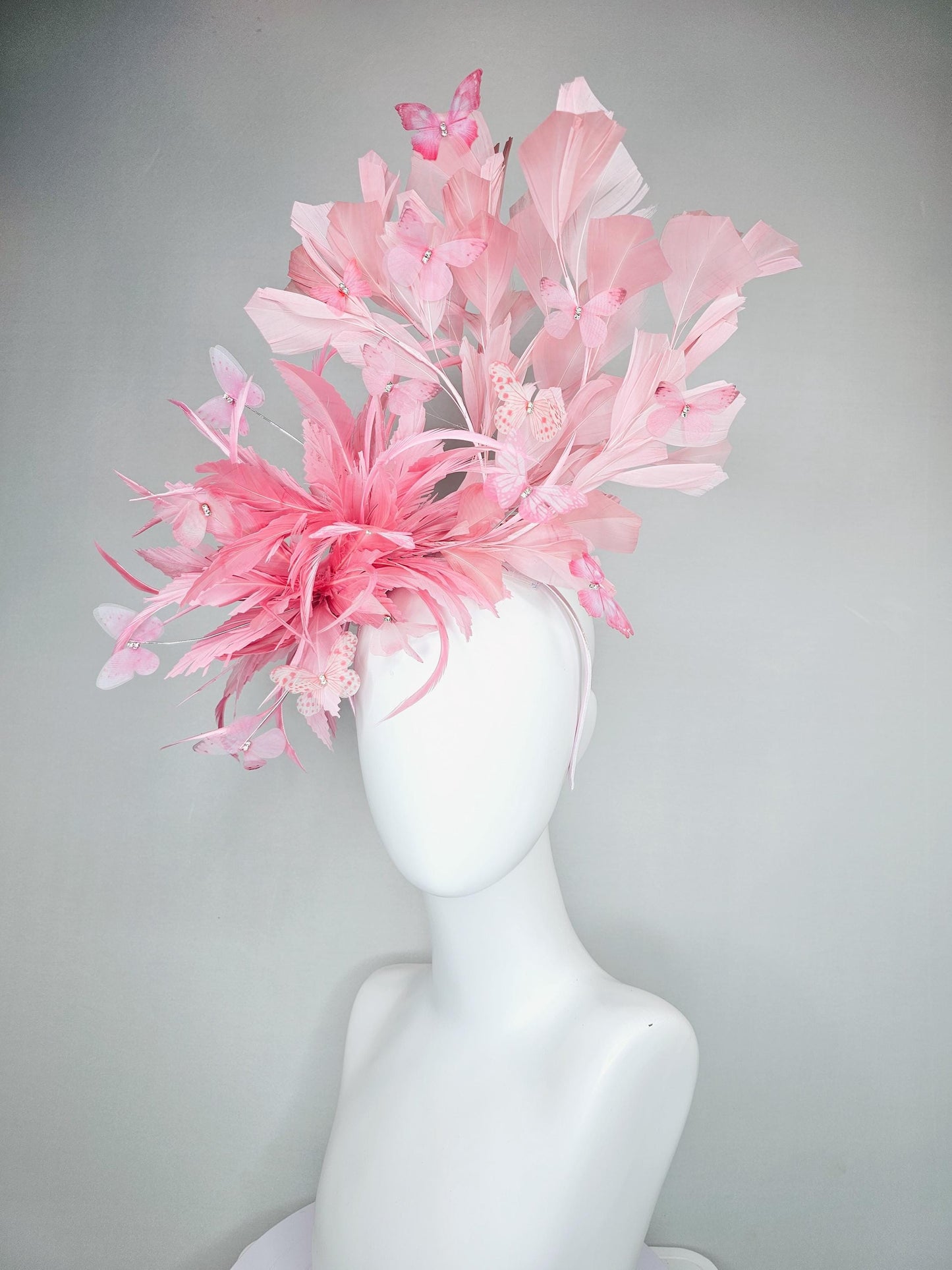 kentucky derby hat fascinator with fluffy light blush pink zigzag feather, light blush pink branching feathers, light blush pink butterflies