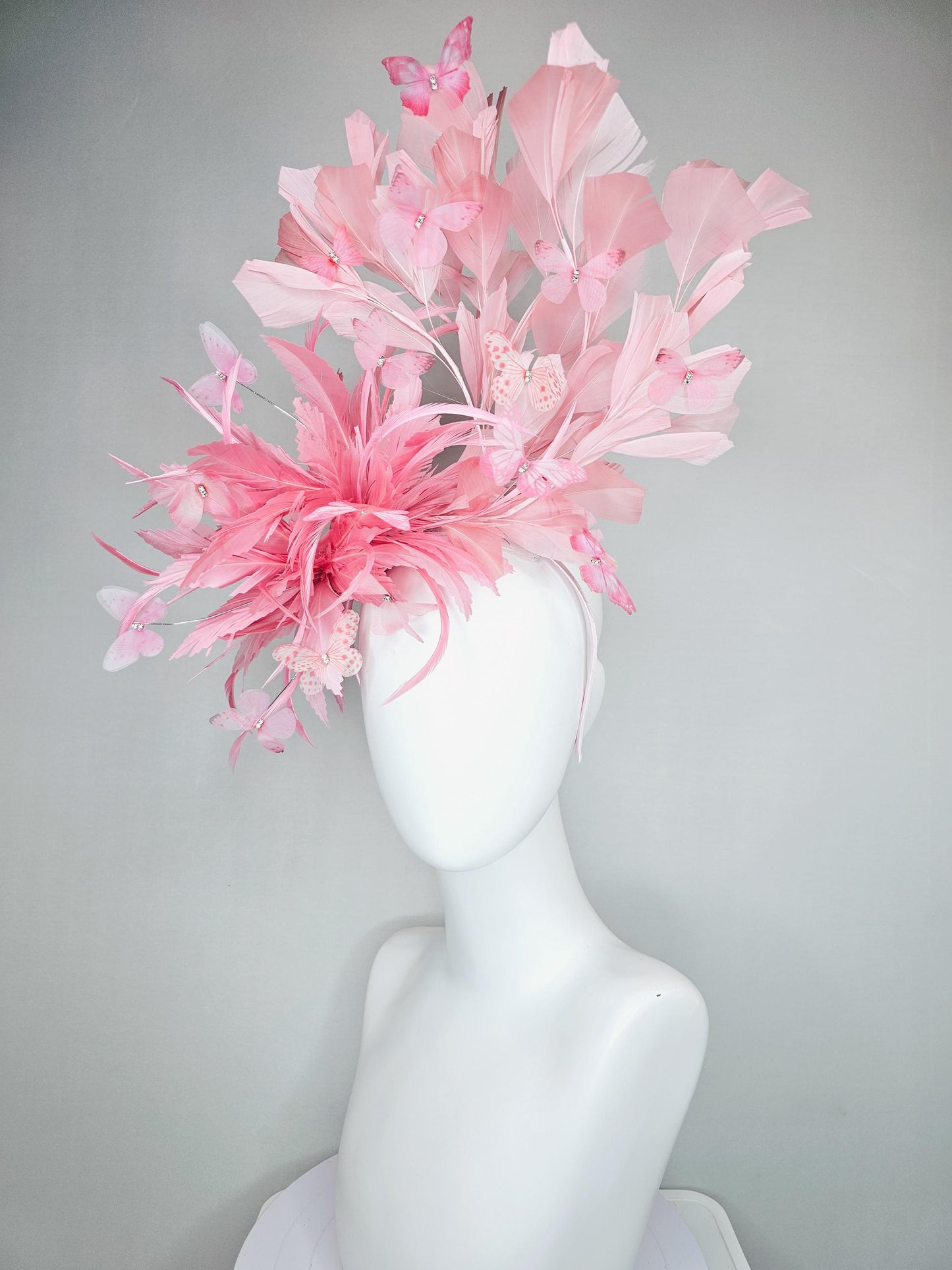 kentucky derby hat fascinator with fluffy light blush pink zigzag feather, light blush pink branching feathers, light blush pink butterflies