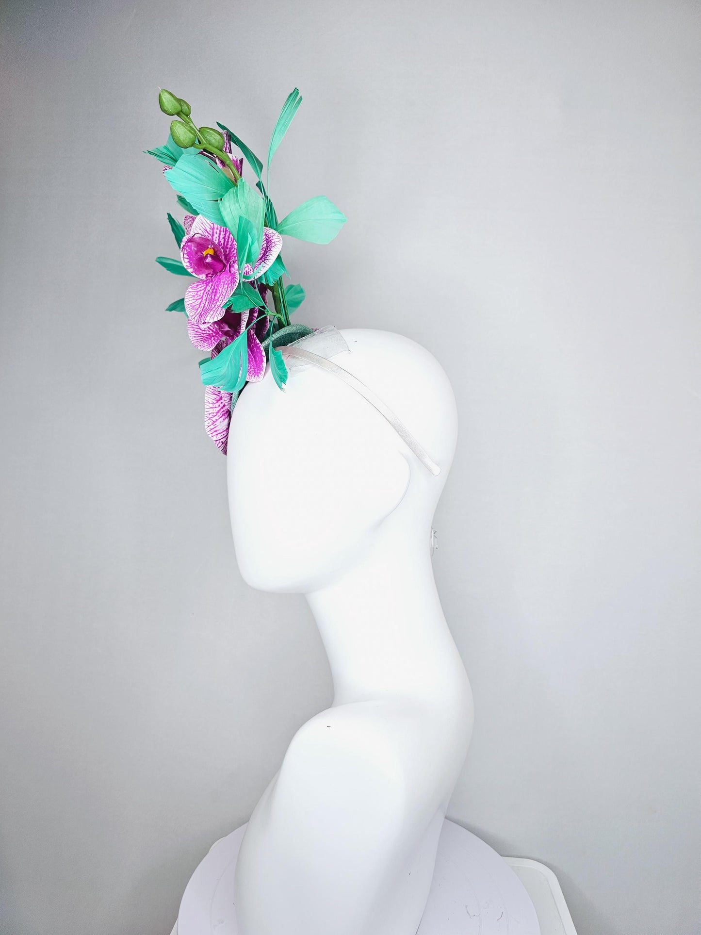 kentucky derby hat fascinator white and purple orchid satin silk flowers, bright mint green branching feathers