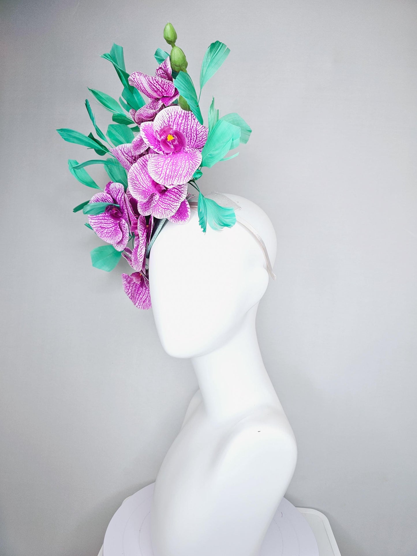 kentucky derby hat fascinator white and purple orchid satin silk flowers, bright mint green branching feathers