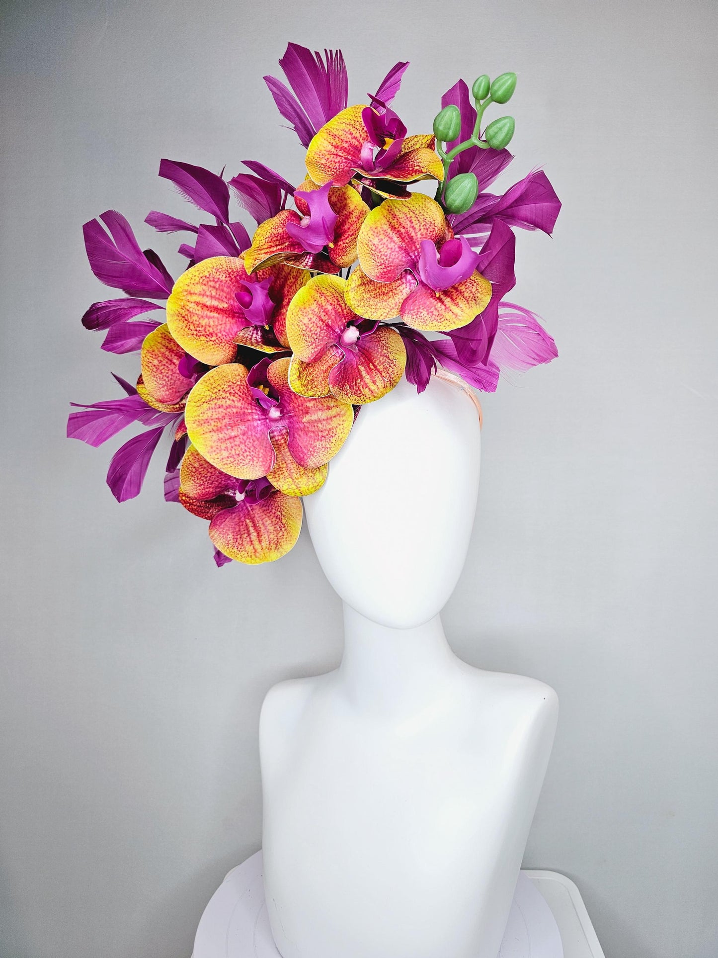 kentucky derby hat fascinator large yellow and pink magenta purple orchid satin silk flowers, magenta purple branching feathers