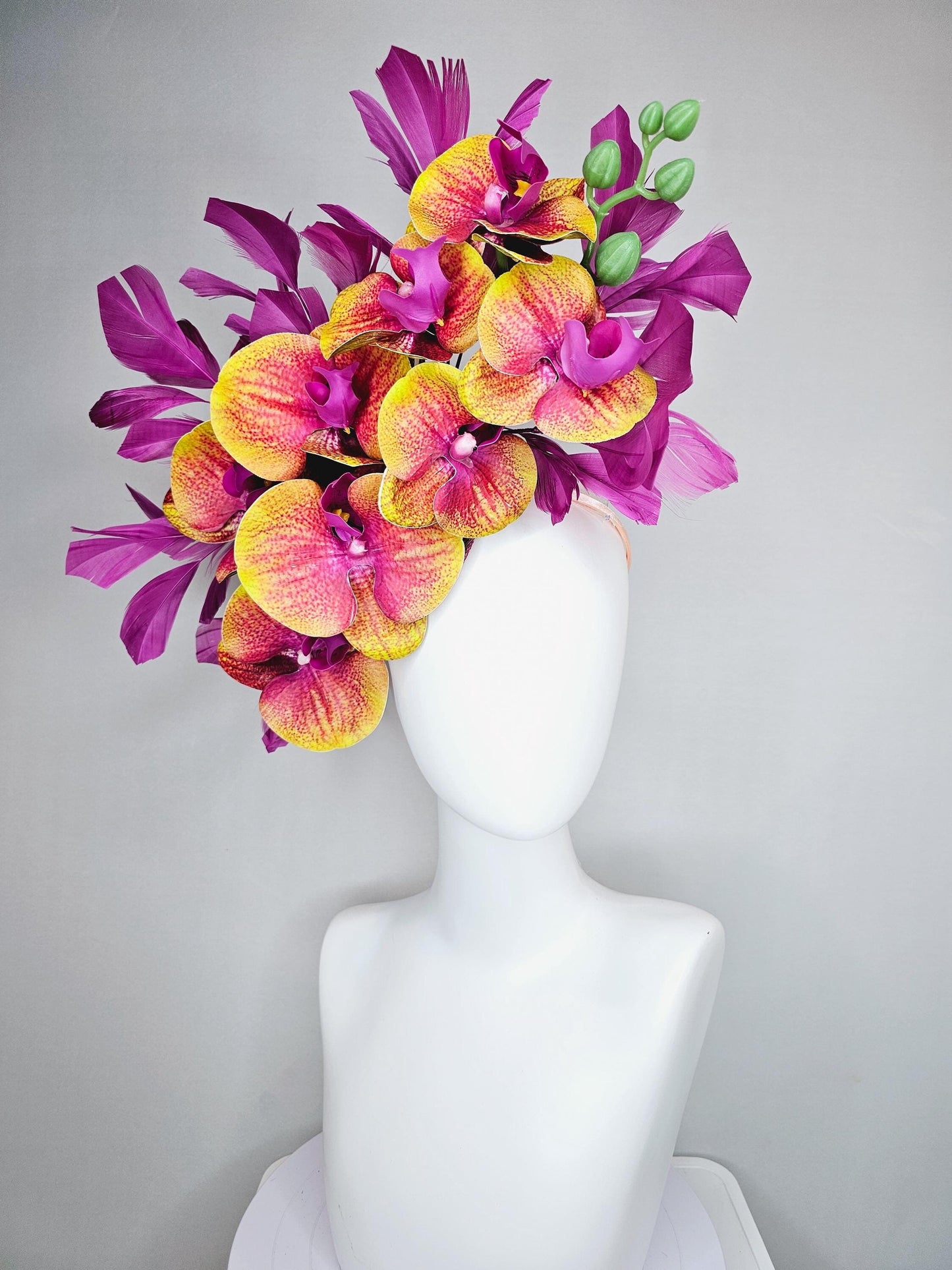 kentucky derby hat fascinator large yellow and pink magenta purple orchid satin silk flowers, magenta purple branching feathers