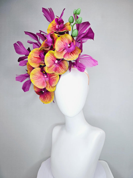 kentucky derby hat fascinator large yellow and pink magenta purple orchid satin silk flowers, magenta purple branching feathers