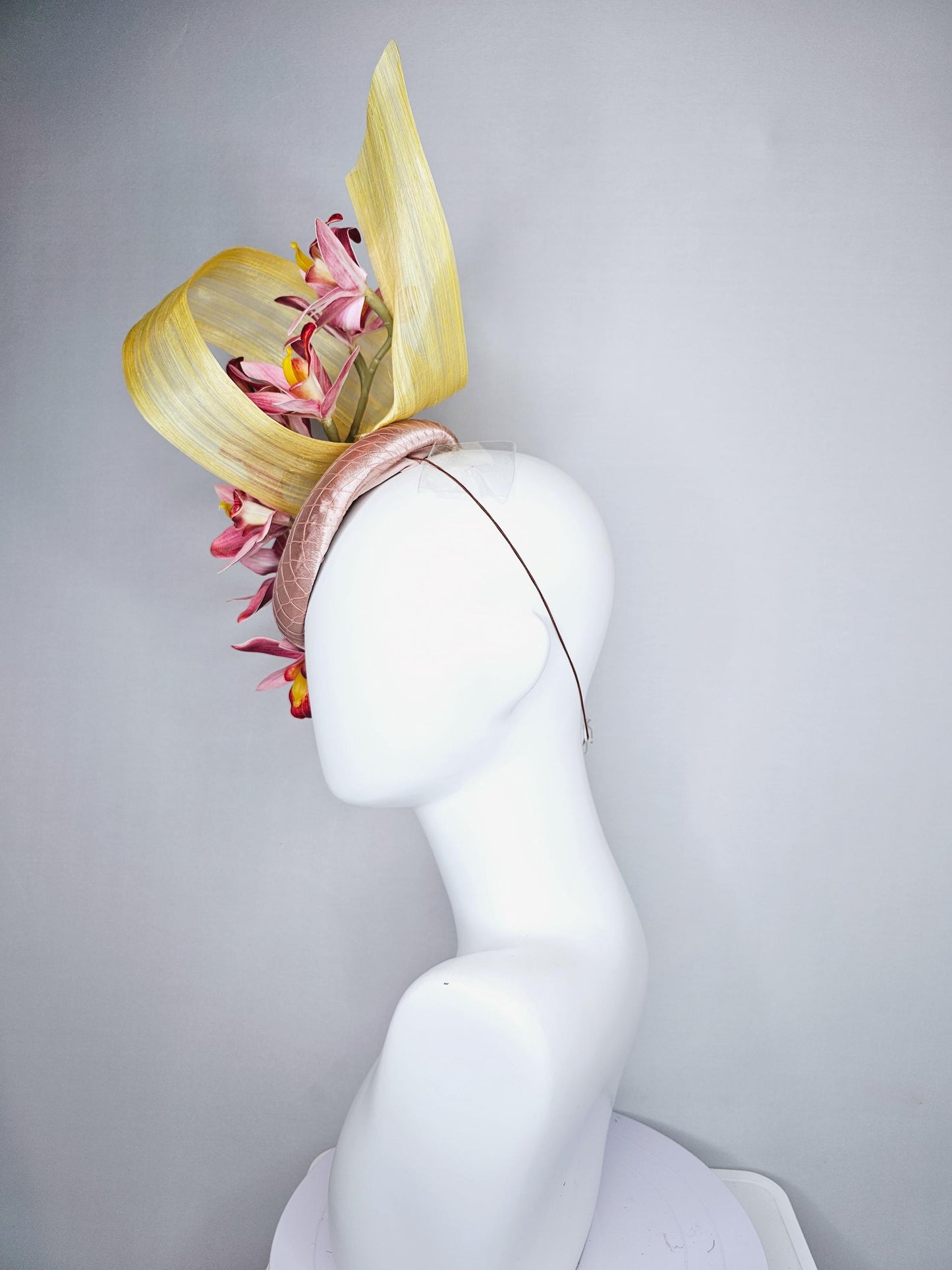 kentucky derby hat fascinator light pink satin with netting, ombre red and yellow orchid flowers, yellow silk ribbon large bendable decor