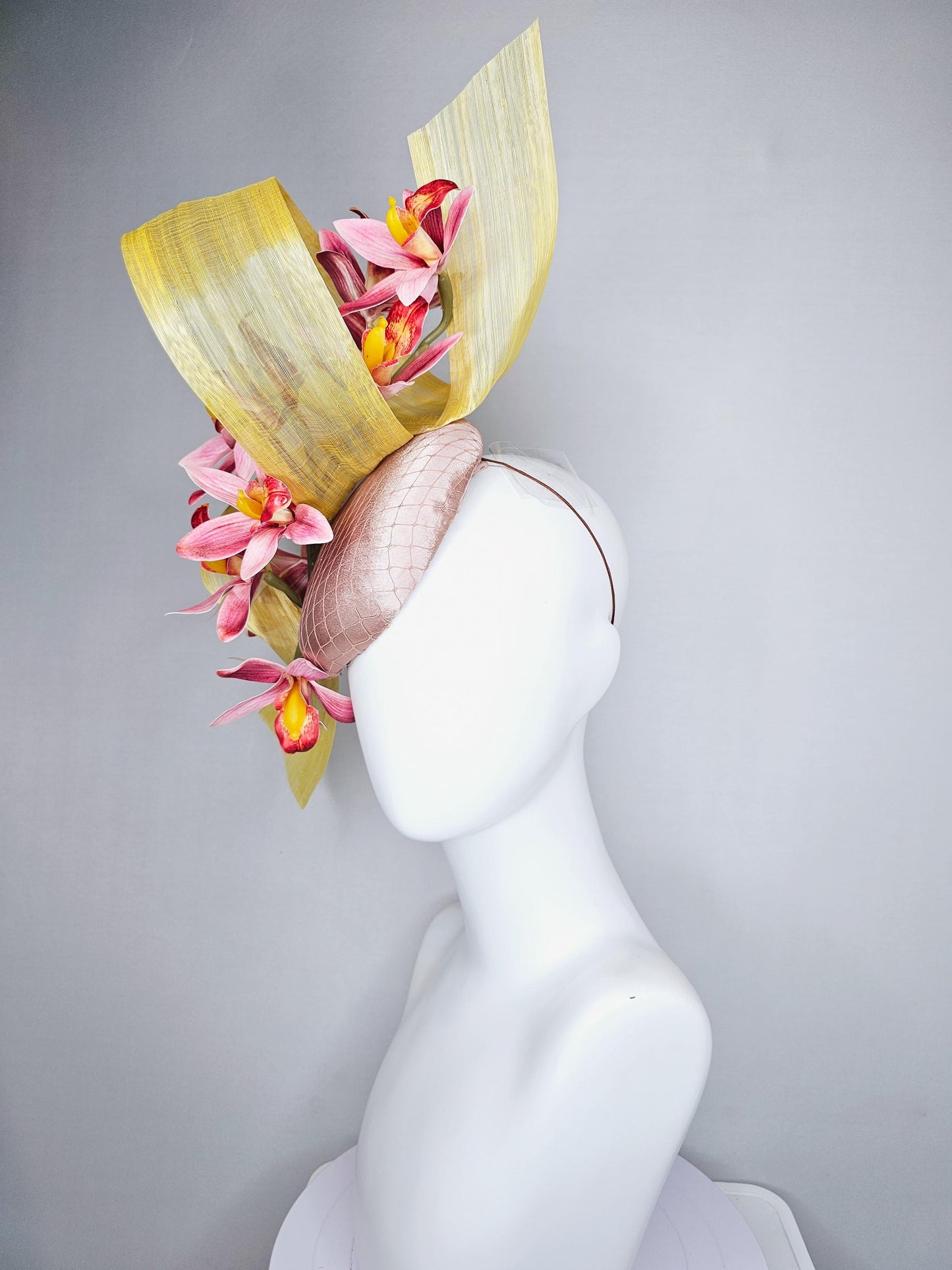 kentucky derby hat fascinator light pink satin with netting, ombre red and yellow orchid flowers, yellow silk ribbon large bendable decor