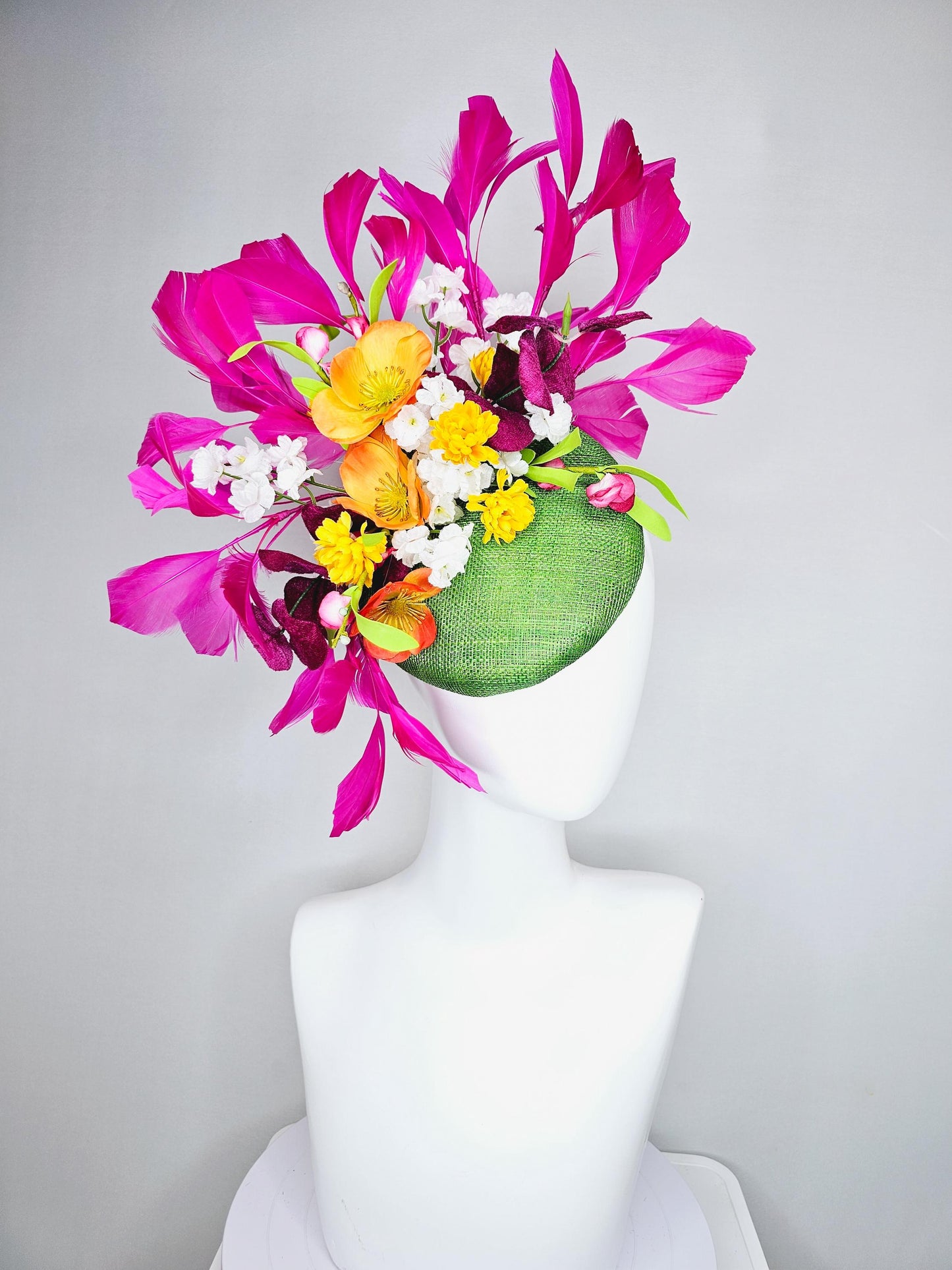 kentucky derby hat fascinator lime green sinamay with yellow orange white pink satin flowers, green leaves, fuchsia pink branching feathers