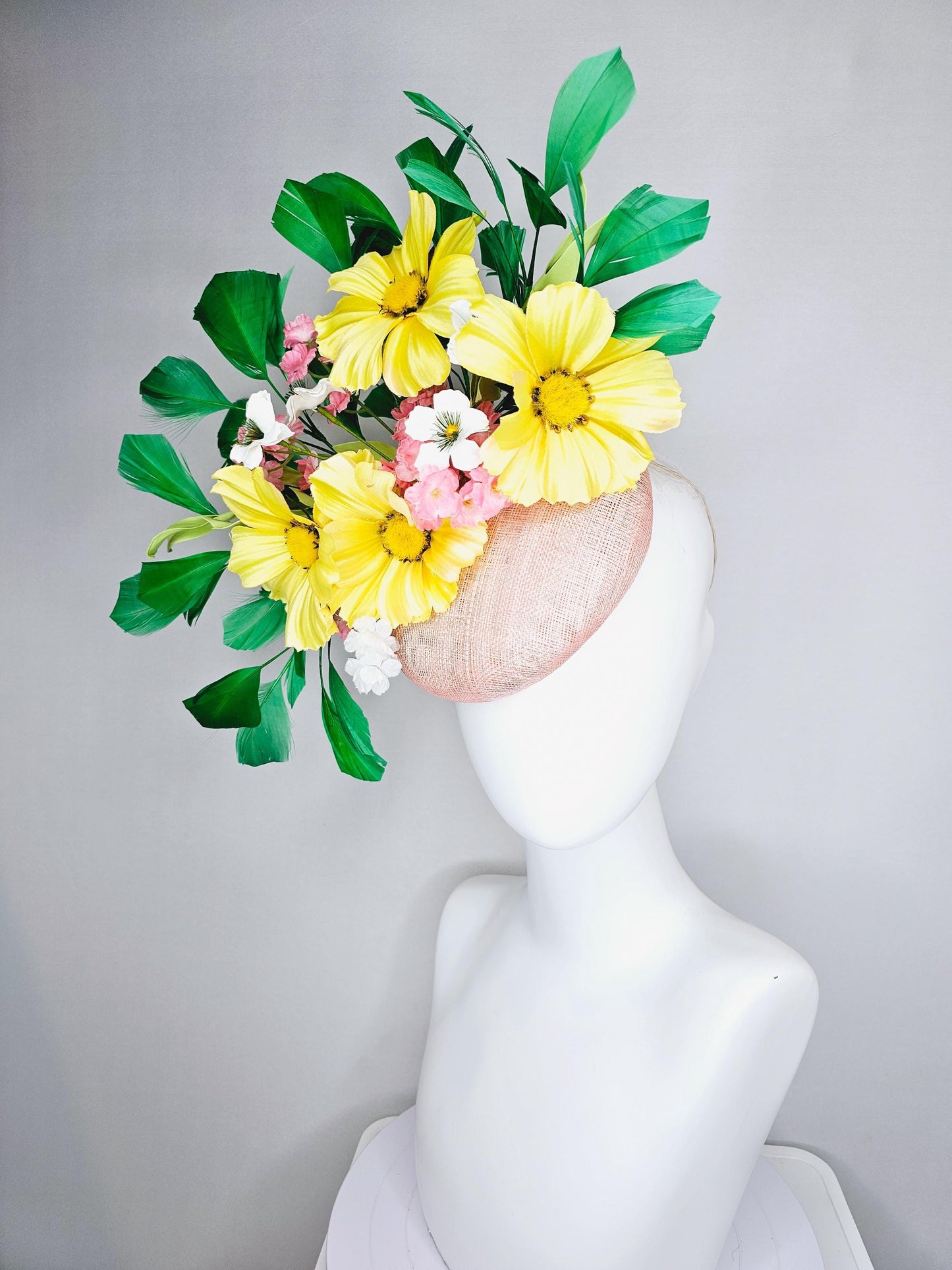 kentucky derby hat fascinator light pink sinamay with yellow white blush pink satin flowers, green leaves, emerald green branching feathers