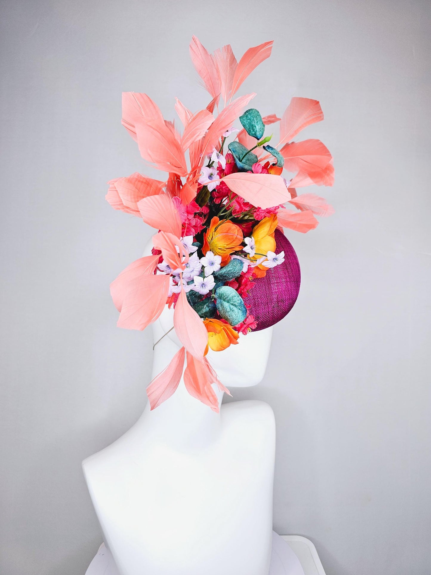 kentucky derby hat fascinator magenta purple sinamay, orange cherry red white satin flowers,teal blue leaves,coral orange branching feathers