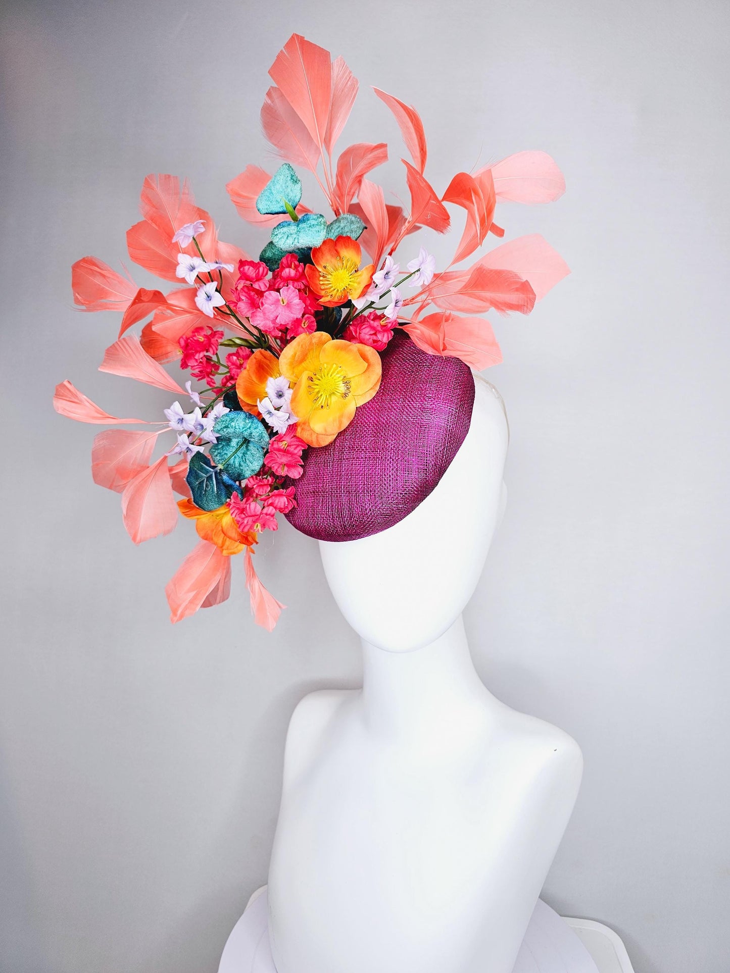 kentucky derby hat fascinator magenta purple sinamay, orange cherry red white satin flowers,teal blue leaves,coral orange branching feathers