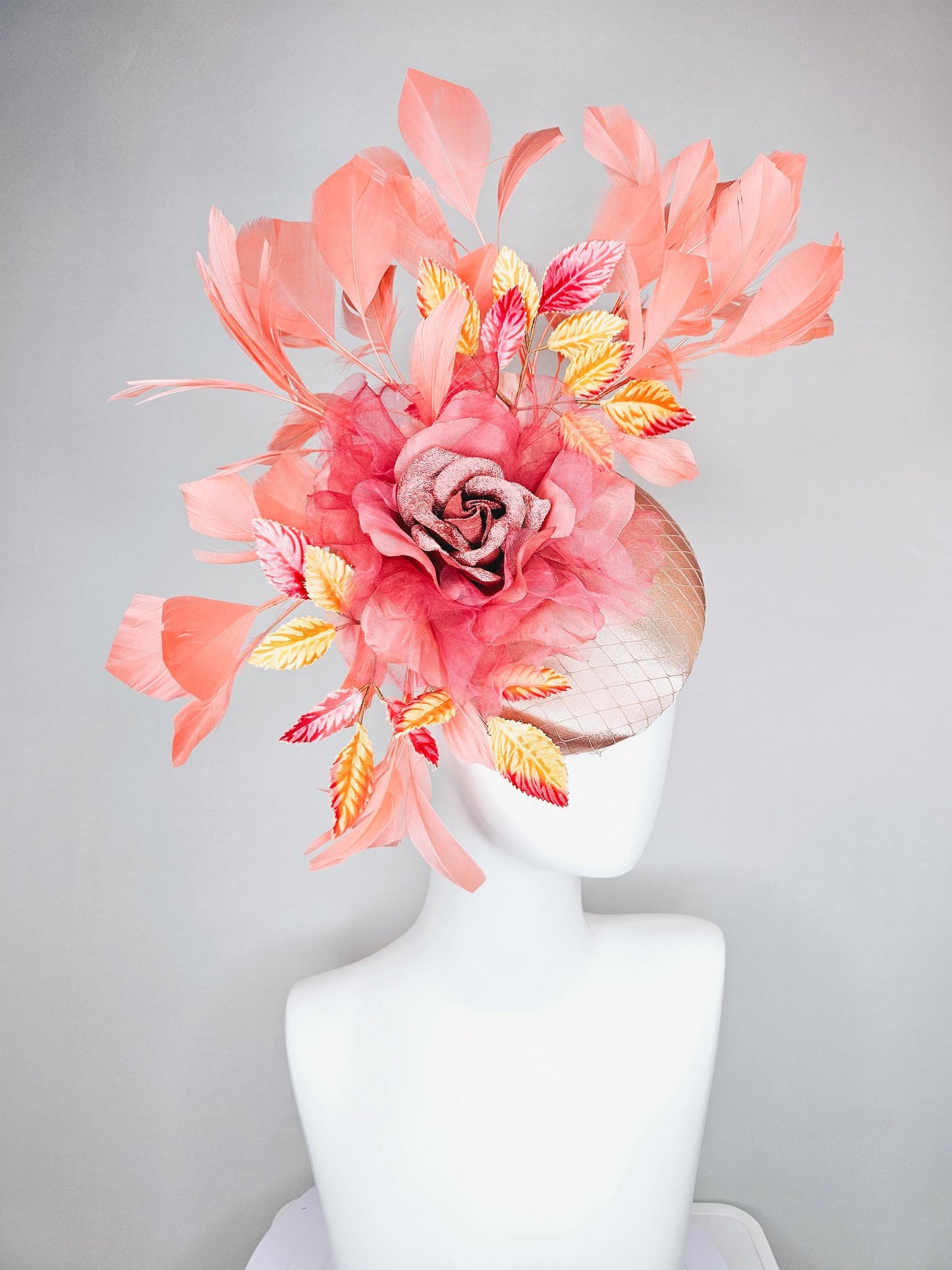 kentucky derby hat fascinator light pink satin w/ netting, dusty pink organza flower,yellow and pink leaves, peach orange branching feathers