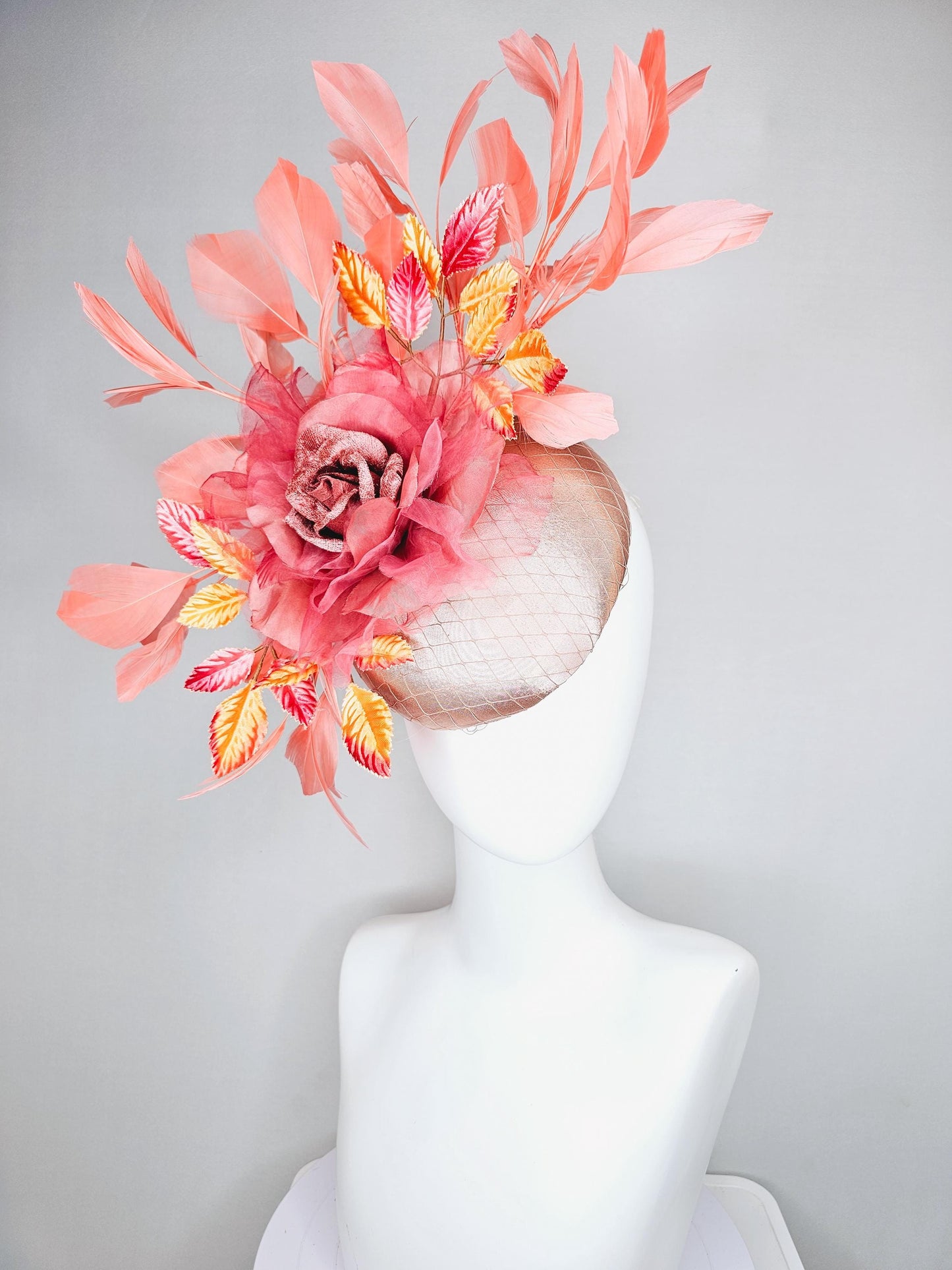 kentucky derby hat fascinator light pink satin w/ netting, dusty pink organza flower,yellow and pink leaves, peach orange branching feathers