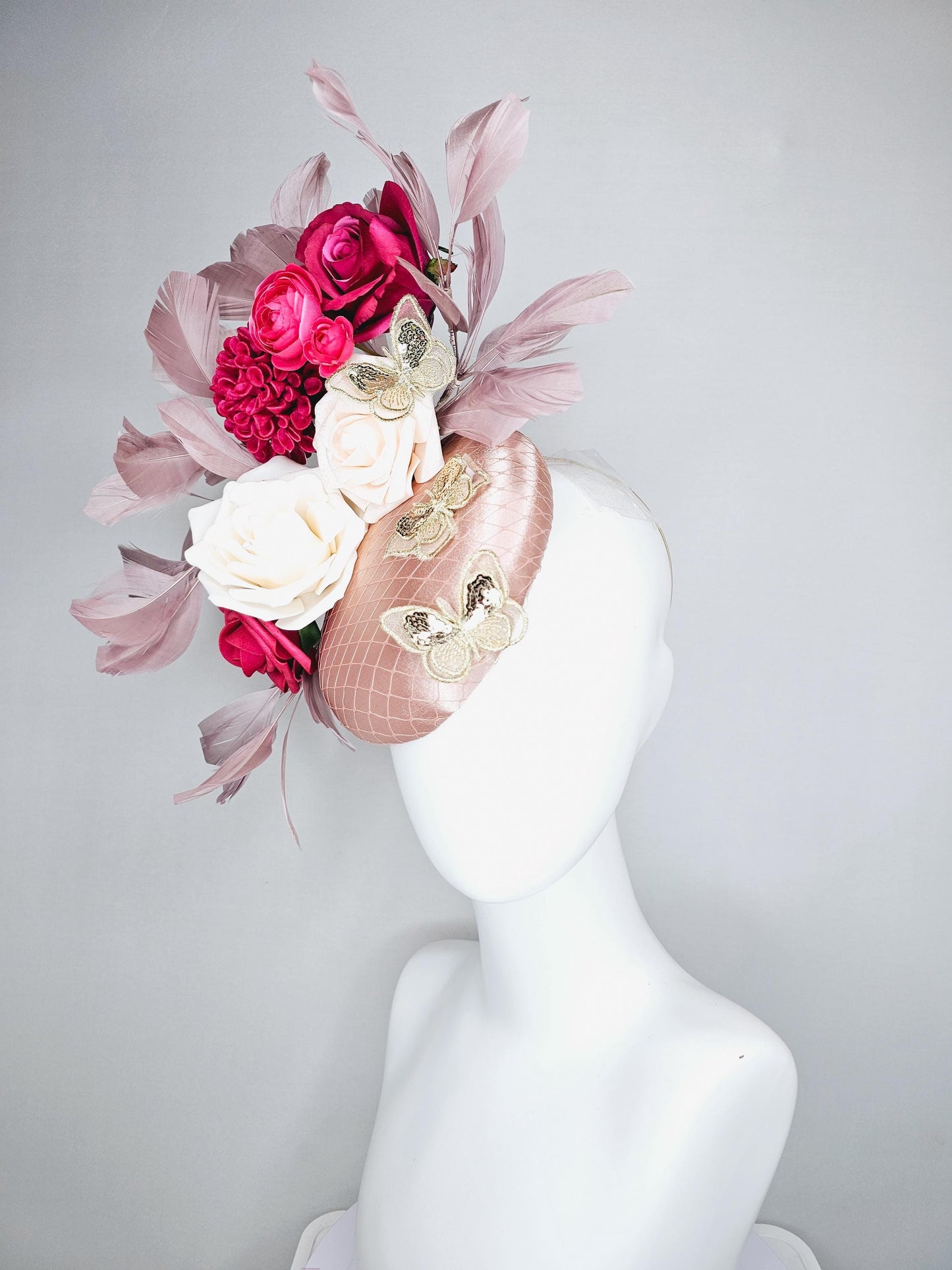 kentucky derby hat fascinator light pink satin with netting, white cherry red satin flowers,taupe branching feathers,gold sequin butterflies