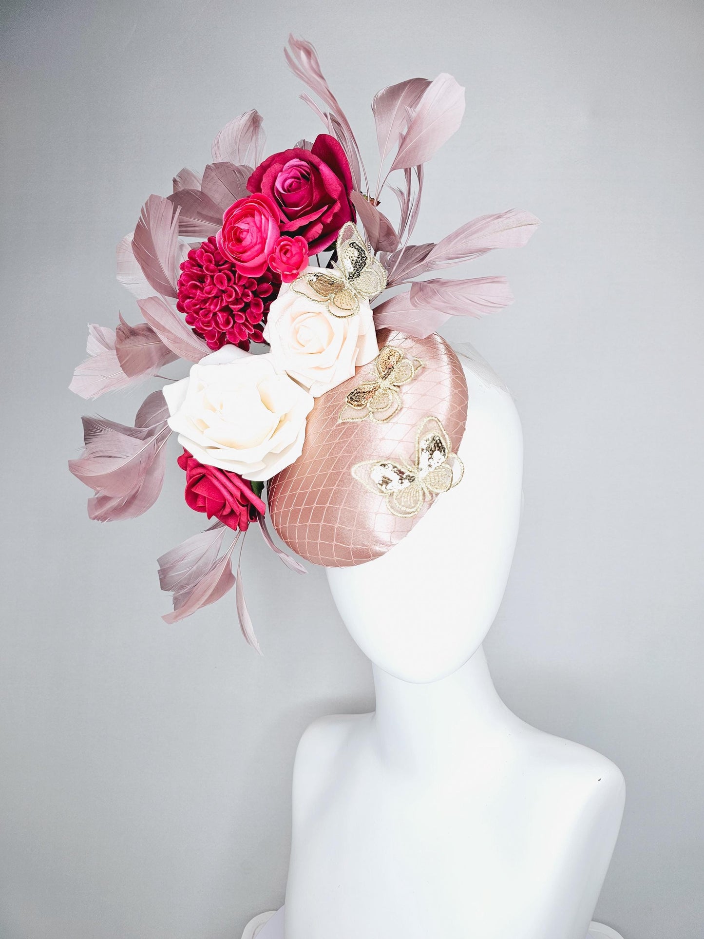 kentucky derby hat fascinator light pink satin with netting, white cherry red satin flowers,taupe branching feathers,gold sequin butterflies