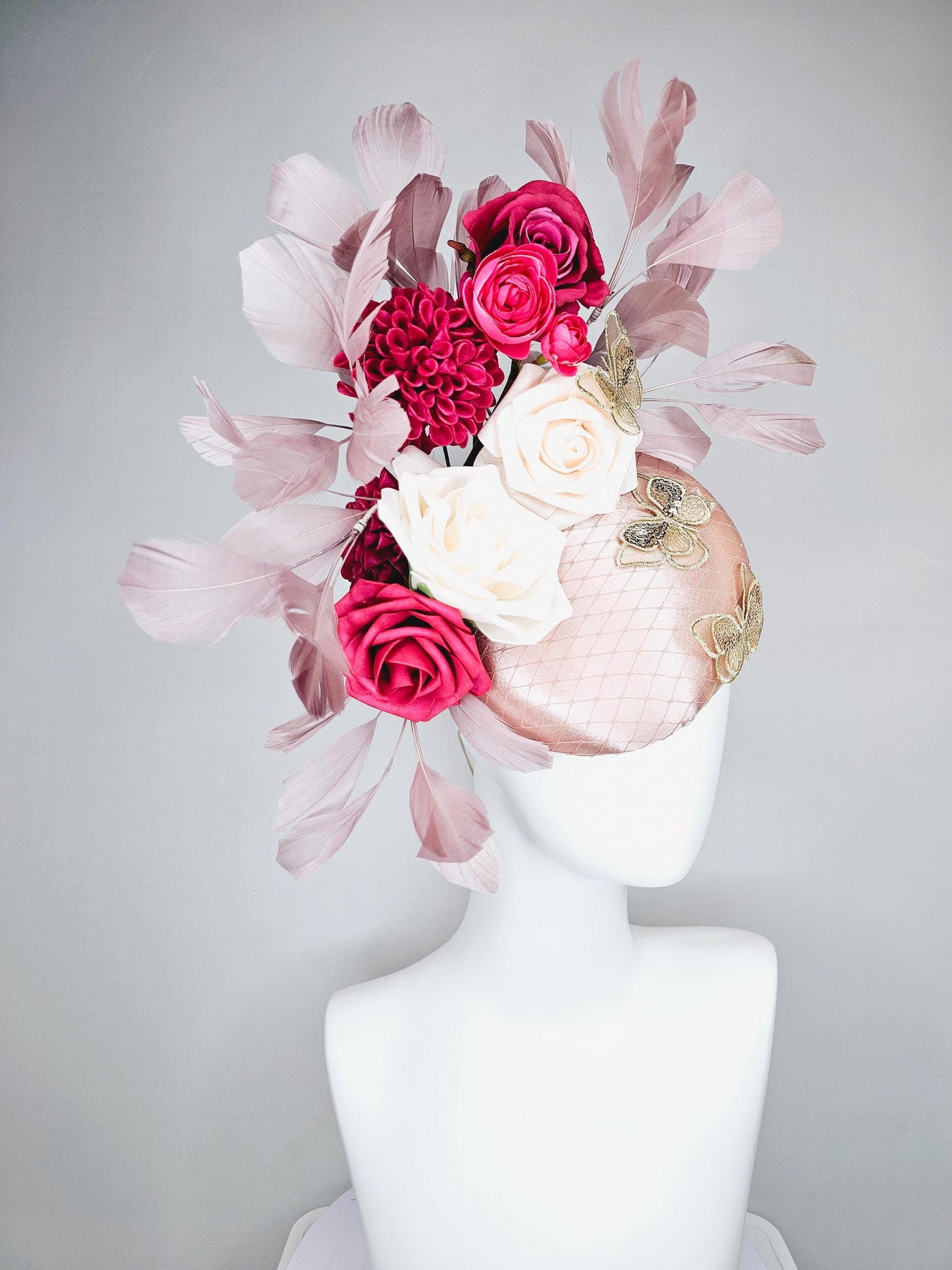 kentucky derby hat fascinator light pink satin with netting, white cherry red satin flowers,taupe branching feathers,gold sequin butterflies