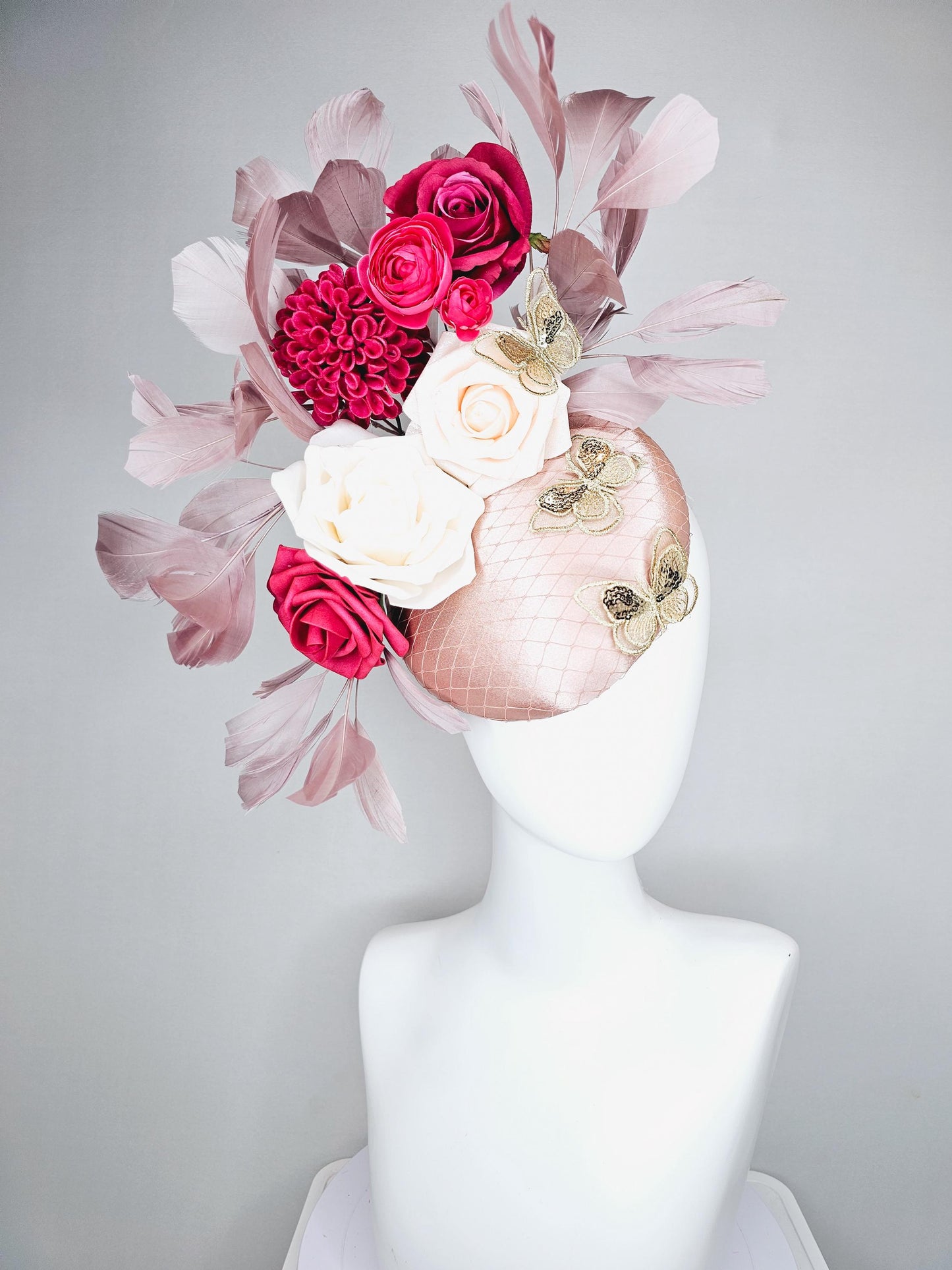 kentucky derby hat fascinator light pink satin with netting, white cherry red satin flowers,taupe branching feathers,gold sequin butterflies