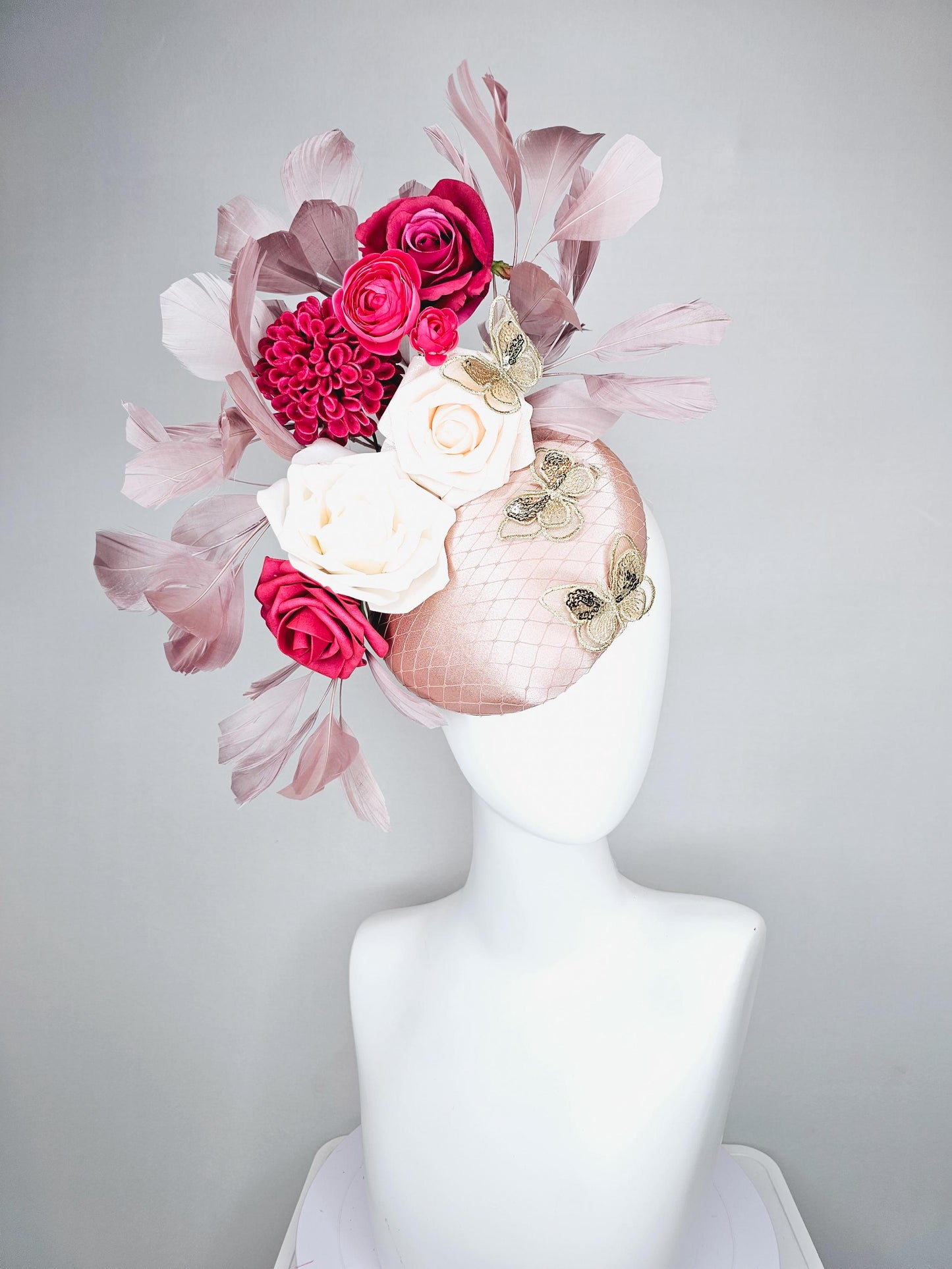 kentucky derby hat fascinator light pink satin with netting, white cherry red satin flowers,taupe branching feathers,gold sequin butterflies