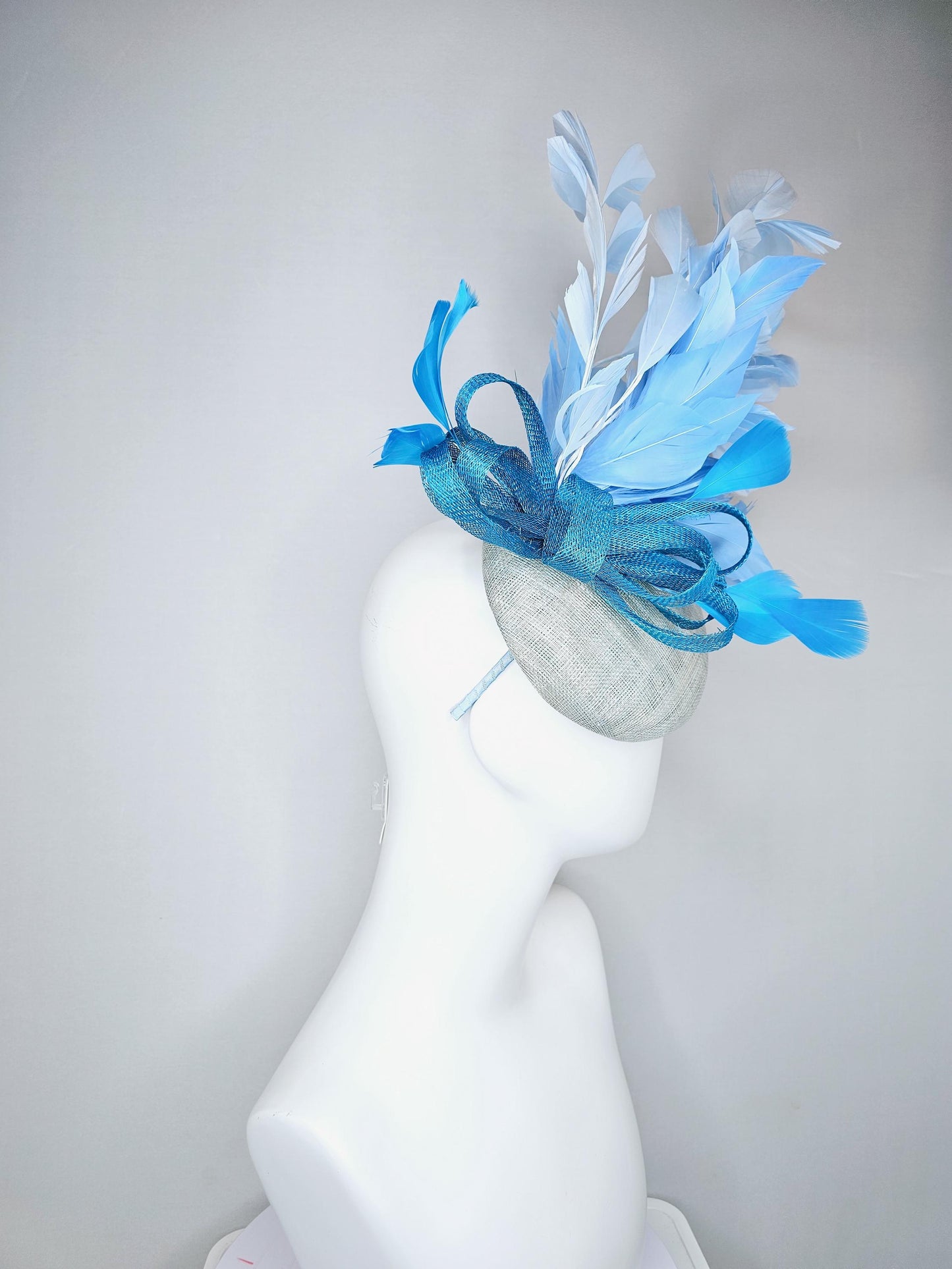 kentucky derby hat fascinator light baby blue sinamay base with blue sinamay bow, sky blue baby blue light blue branching feathers