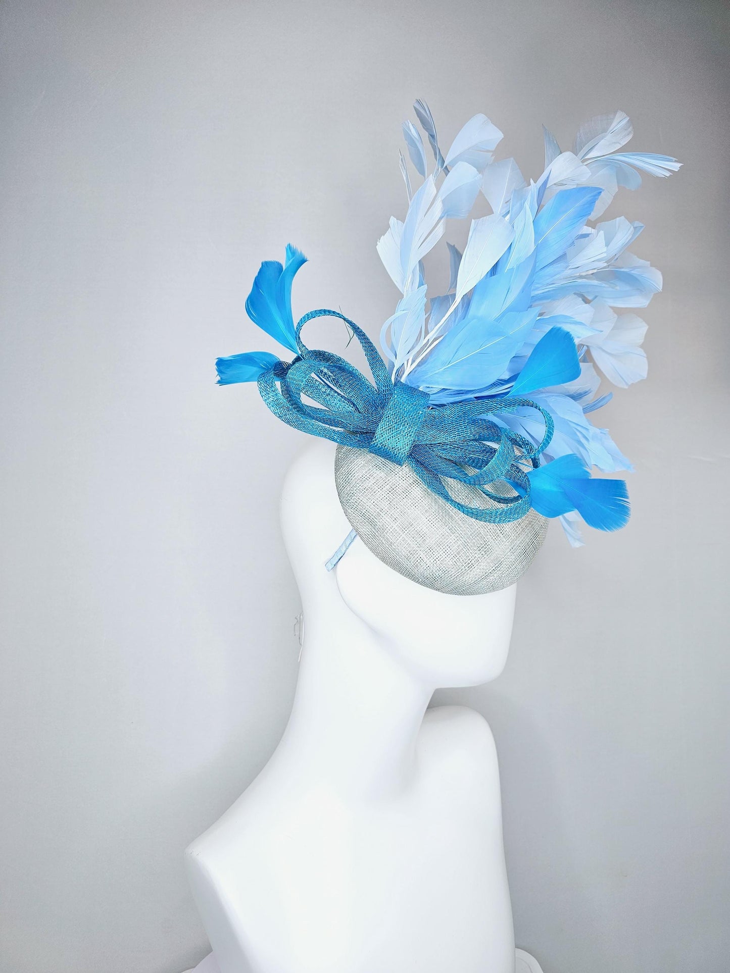 kentucky derby hat fascinator light baby blue sinamay base with blue sinamay bow, sky blue baby blue light blue branching feathers