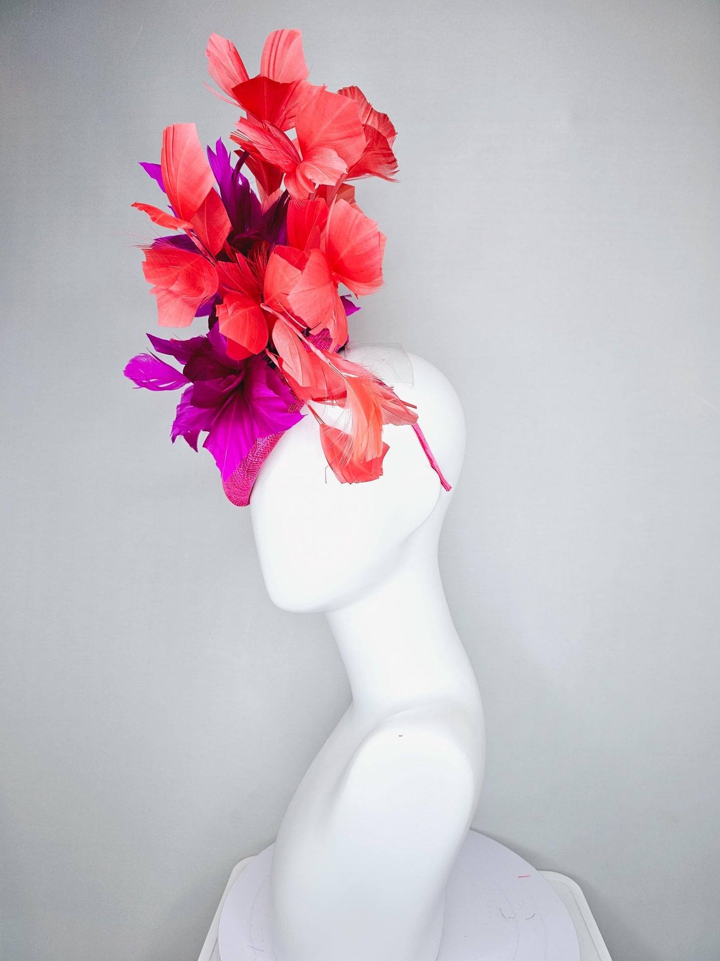 kentucky derby hat fascinator hot bright pink sinamay base with bright pink sinamay bow flower, pink fuchsia coral orange branching feathers