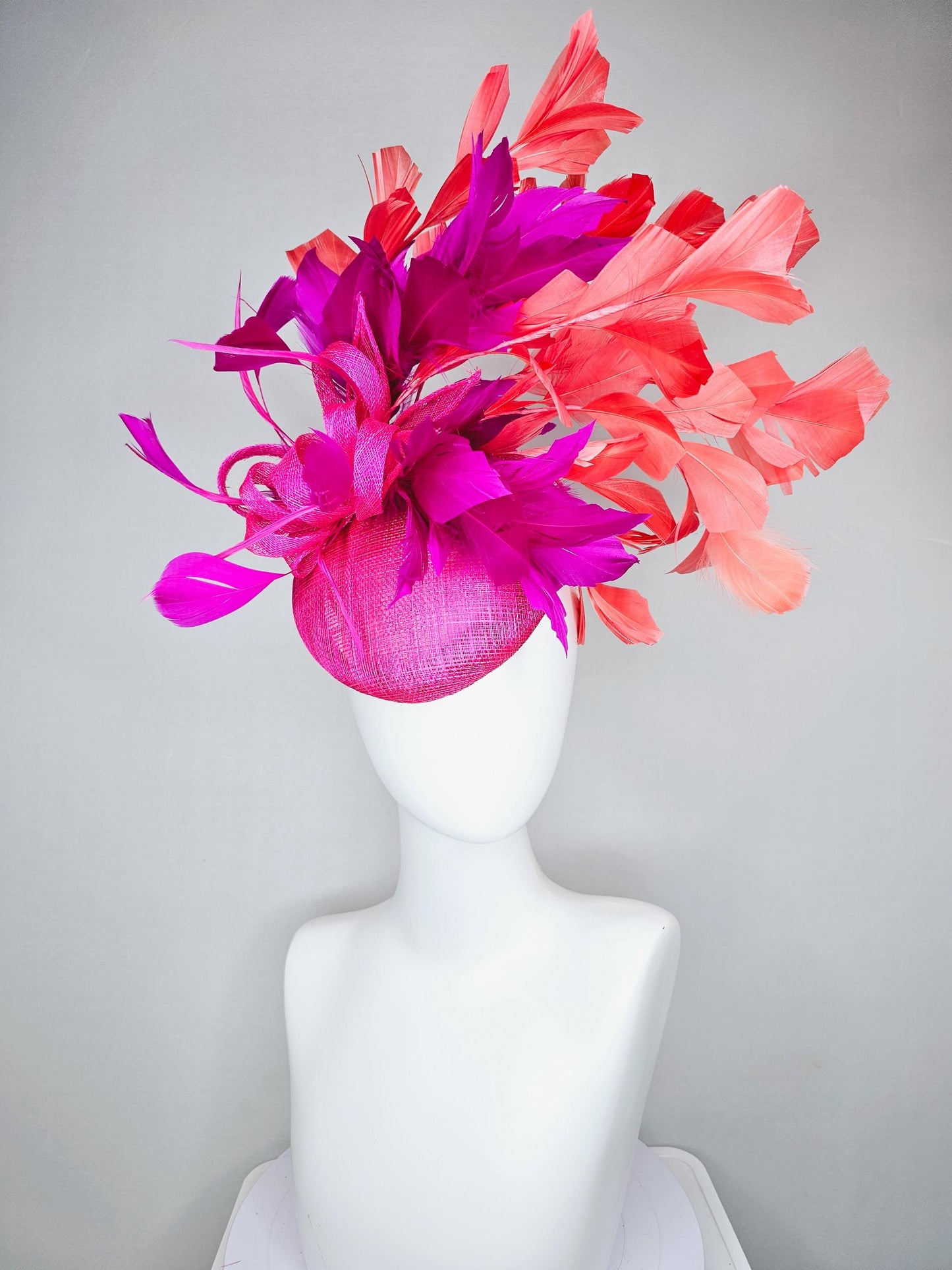 kentucky derby hat fascinator hot bright pink sinamay base with bright pink sinamay bow flower, pink fuchsia coral orange branching feathers