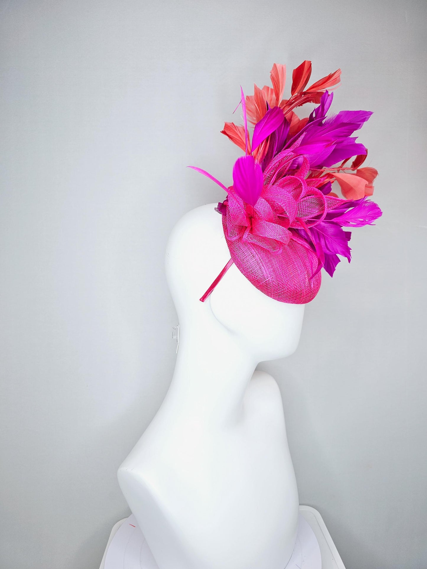 kentucky derby hat fascinator hot bright pink sinamay base with bright pink sinamay bow flower, pink fuchsia coral orange branching feathers