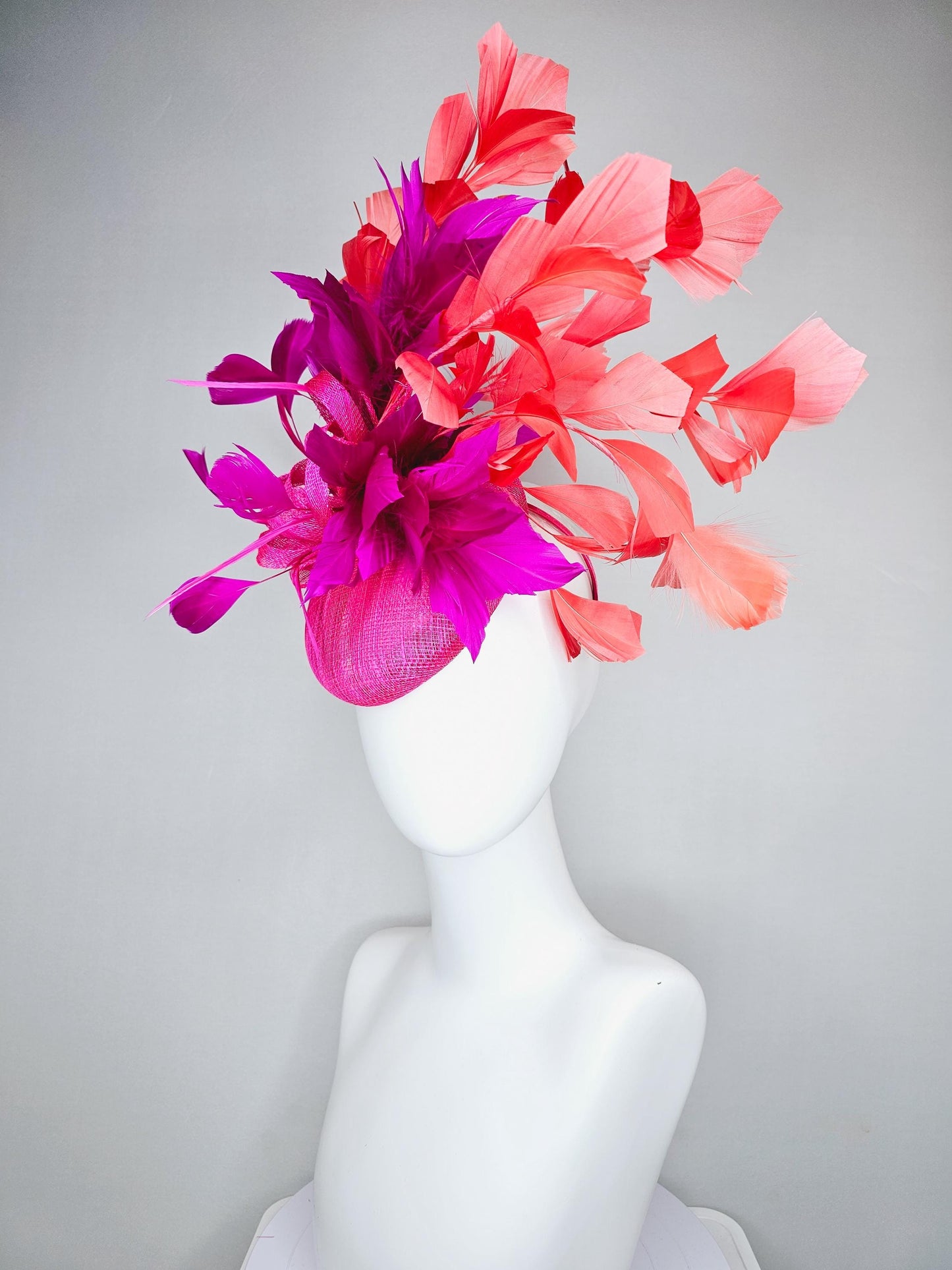 kentucky derby hat fascinator hot bright pink sinamay base with bright pink sinamay bow flower, pink fuchsia coral orange branching feathers