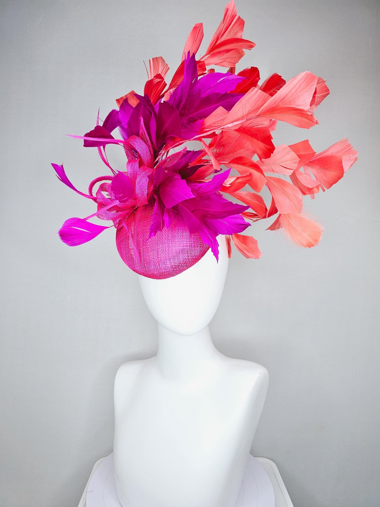 kentucky derby hat fascinator hot bright pink sinamay base with bright pink sinamay bow flower, pink fuchsia coral orange branching feathers