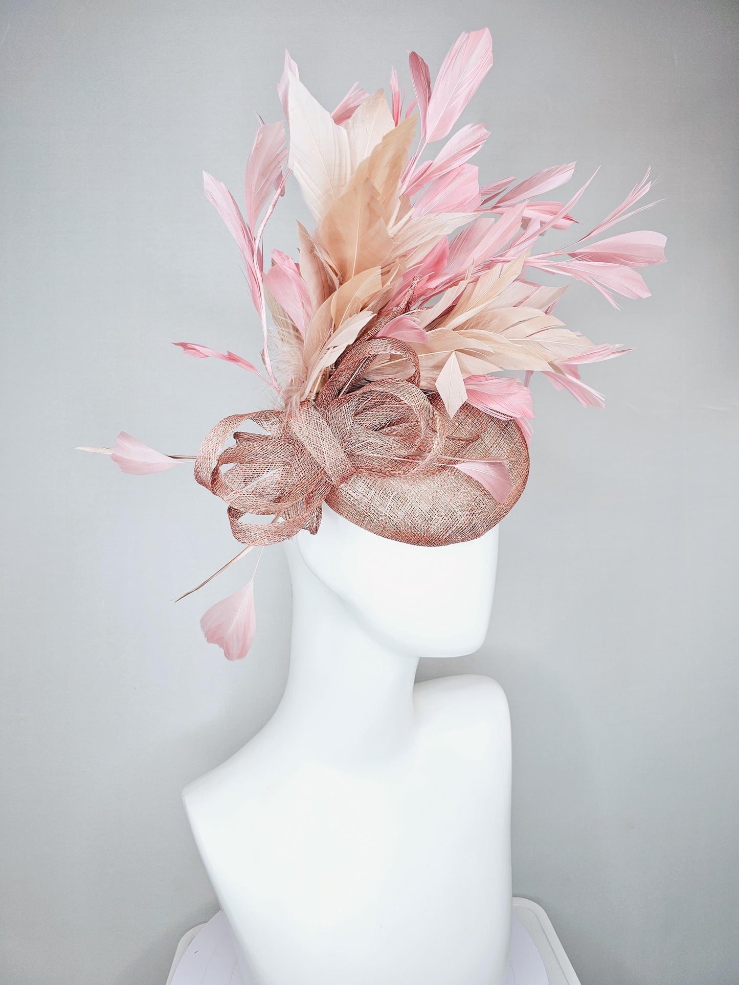 kentucky derby hat fascinator dusty pink sinamay base with dusty pink sinamay bow flower, dusty pink champagne light pink branching feathers