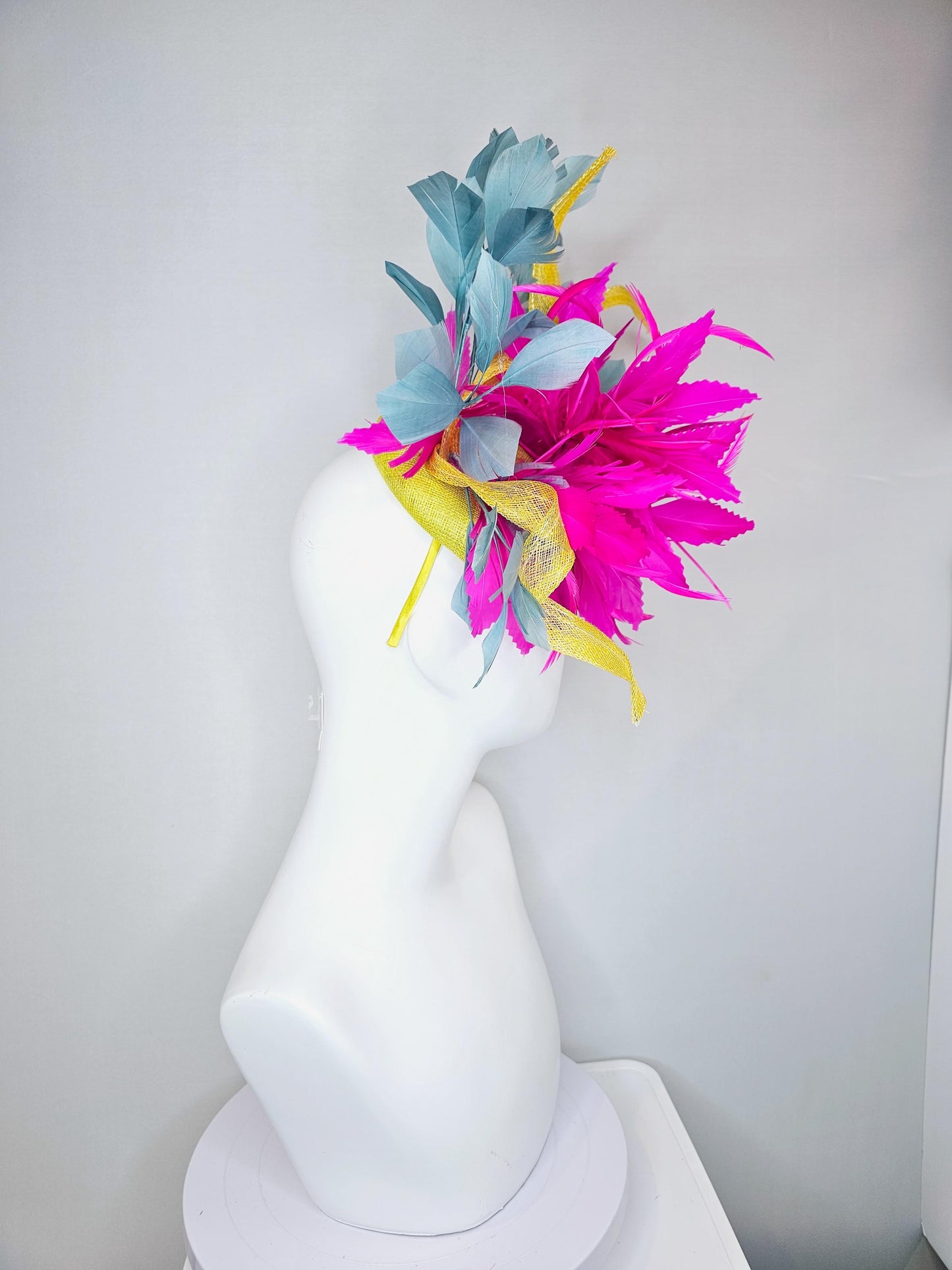 kentucky derby hat fascinator bright yellow sinamay with curls,bright hot pink feather flowers and teal blue branching feathers