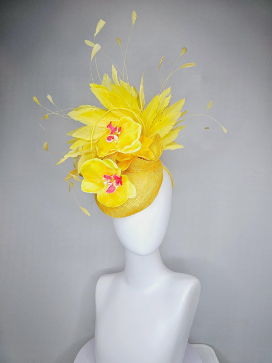 kentucky derby hat fascinator bright yellow sinamay with curls and yellow branching feathers with satin yellow and pink orchids