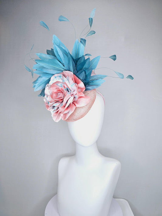 kentucky derby hat fascinator light baby pink sinamay with bright blue branching feathers and large pink and blue tie dye rose flower