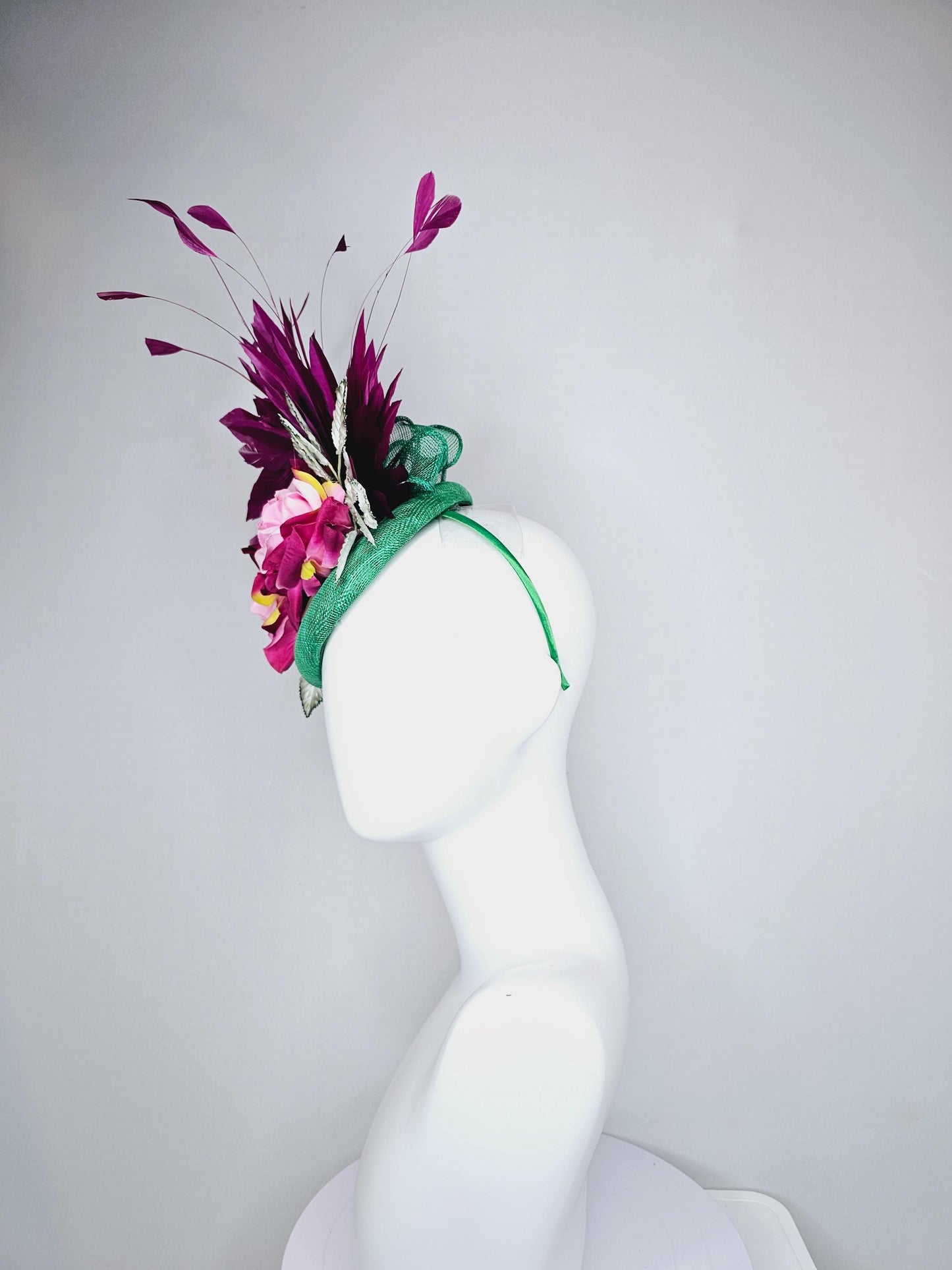 kentucky derby hat fascinator green sinamay with magenta purple branching feathers,light green ombre leaves,pink yellow fuchsia satin roses