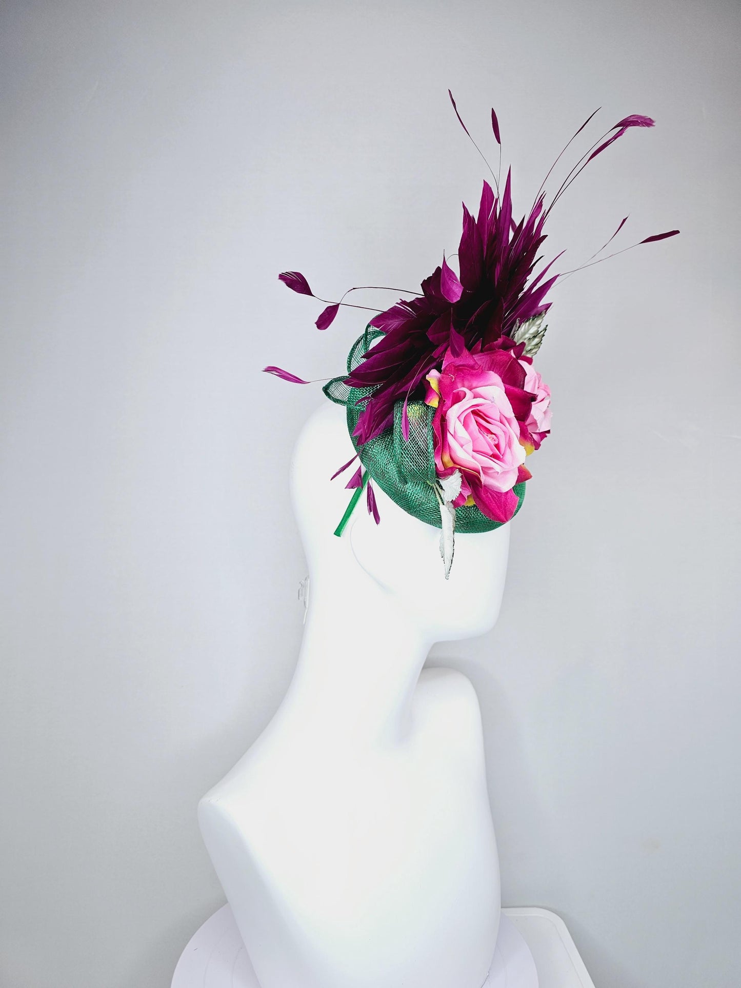 kentucky derby hat fascinator green sinamay with magenta purple branching feathers,light green ombre leaves,pink yellow fuchsia satin roses