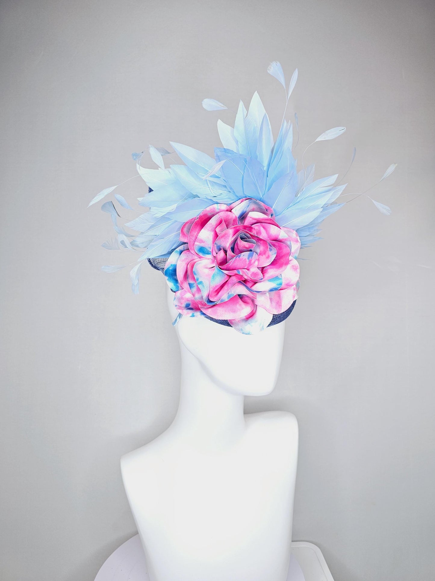 kentucky derby hat fascinator blue sinamay with light blue branching feathers and large pink and blue tie dye satin rose flower