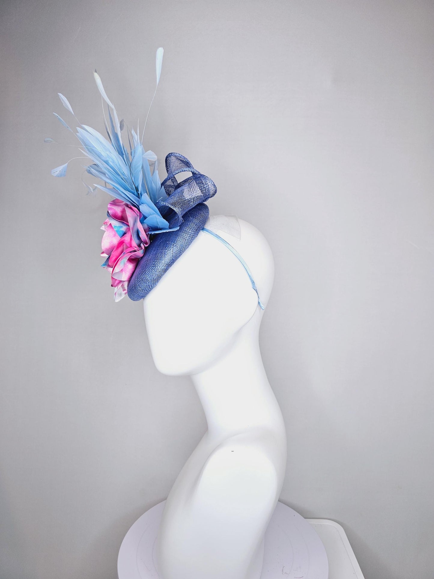 kentucky derby hat fascinator blue sinamay with light blue branching feathers and large pink and blue tie dye satin rose flower