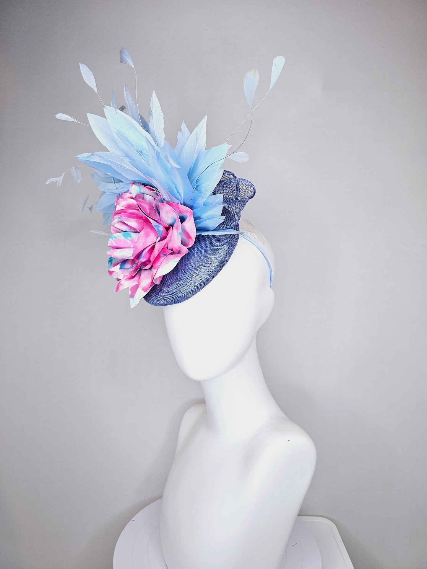 kentucky derby hat fascinator blue sinamay with light blue branching feathers and large pink and blue tie dye satin rose flower