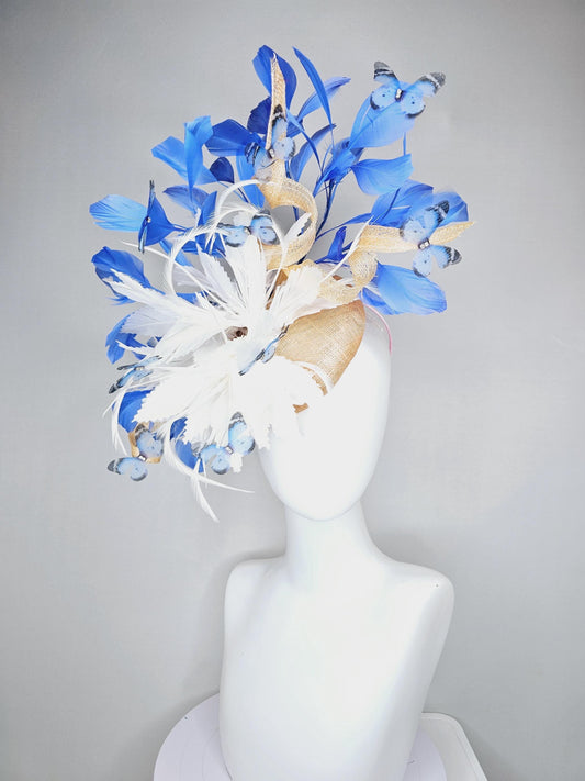kentucky derby hat fascinator neutral beige sinamay with sinamay curls, fluffy white royal cobalt blue feathers, blue and black butterflies